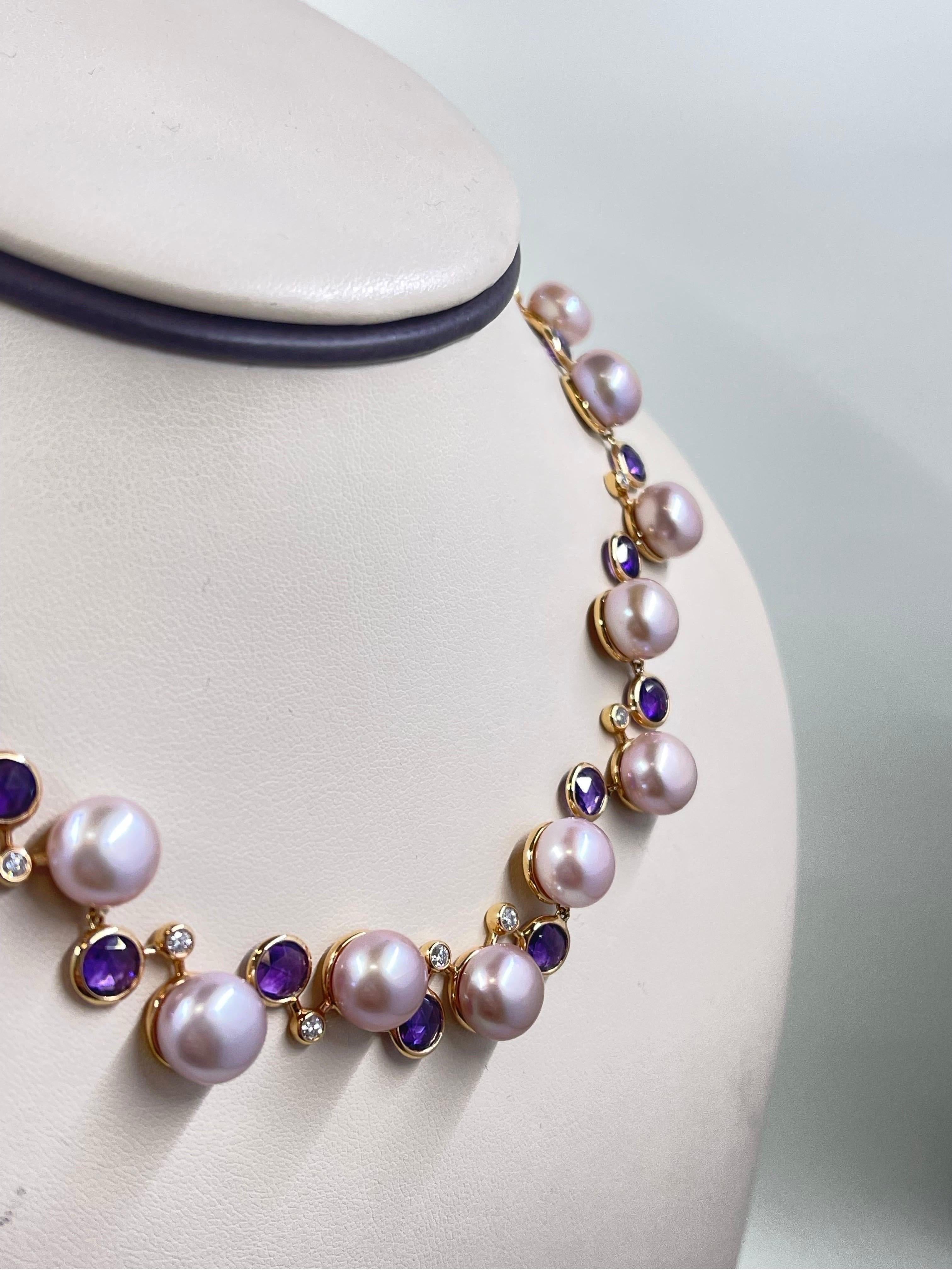 Gorgeous Pink Pearl, Amethyst And Diamond Necklace In 18k rose gold.

Length is adjustable, maximum 16” and can be adjusted to any length smaller.

Natural South Sea 15 Pink Pearls average 10mm each with Amethyst and Diamond Accents set in 18k rose