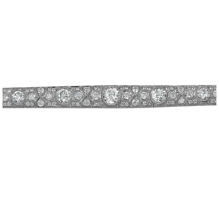 All diamond platinum bracelet with the total carat of 11.77 carats.

Sophia D by Joseph Dardashti LTD has been known worldwide for 35 years and are inspired by classic Art Deco design that merges with modern manufacturing techniques.

