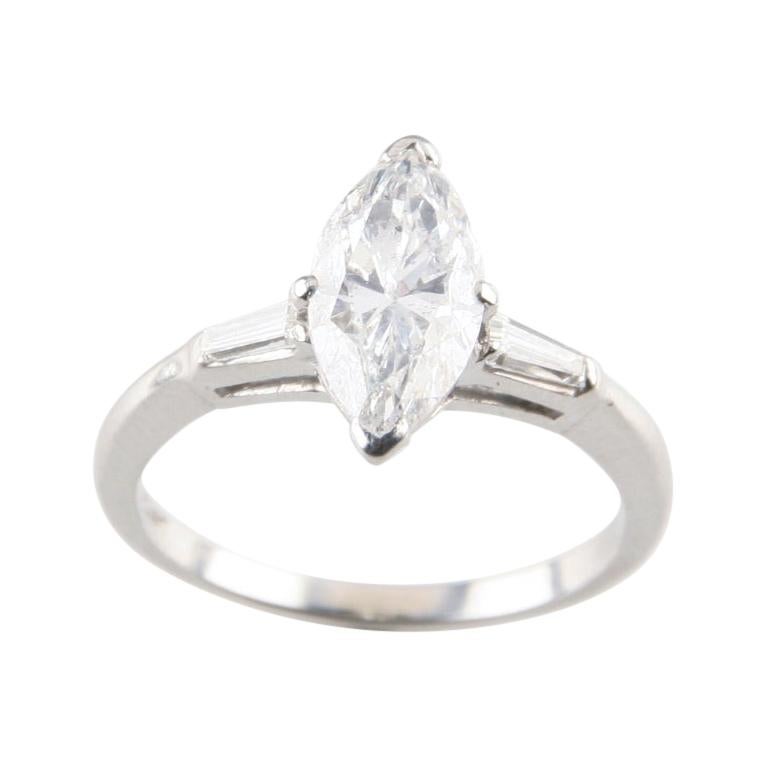 Gorgeous Platinum 1.59 Carat Marquise Solitaire Unity Band with Accents For Sale