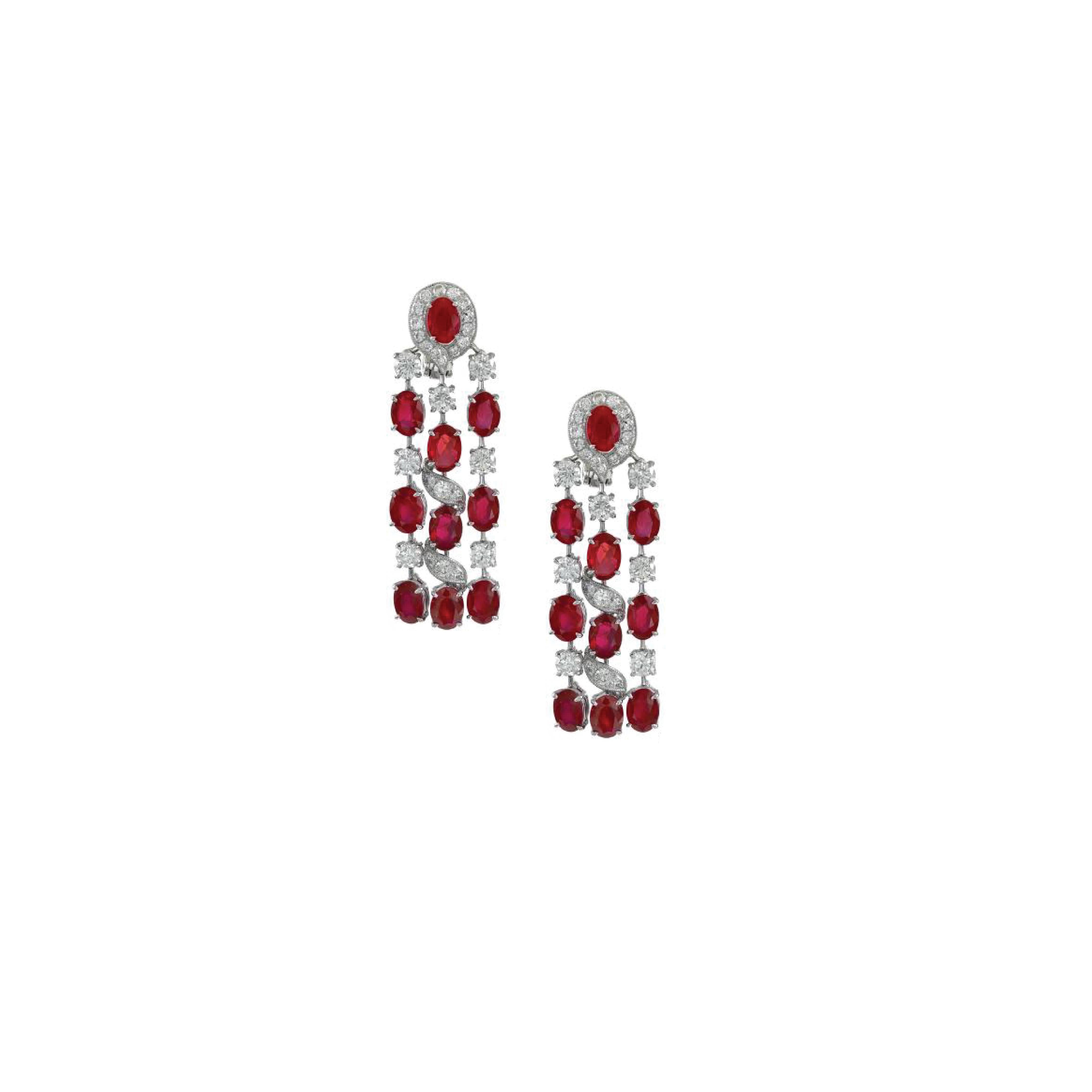 Platinum Set Earrings with Rubies weighing 17.83 carats and Diamonds that weigh 4.94 carats.