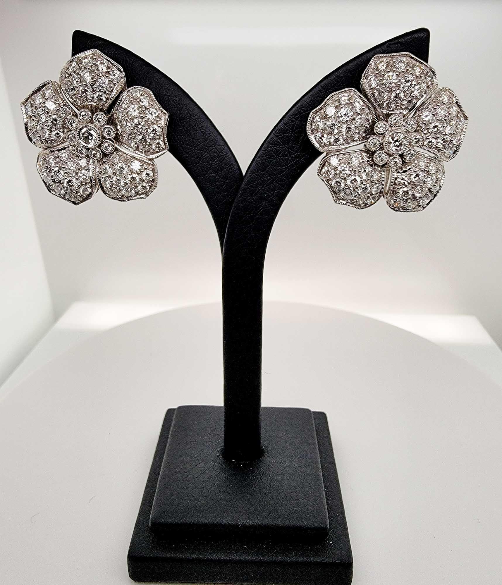 This elegant earrings by Sophia D. is crafted with all beautiful diamonds with the total carat weight of 4.11 carats. 

Sophia D by Joseph Dardashti LTD has been known worldwide for 35 years and are inspired by classic Art Deco design that merges