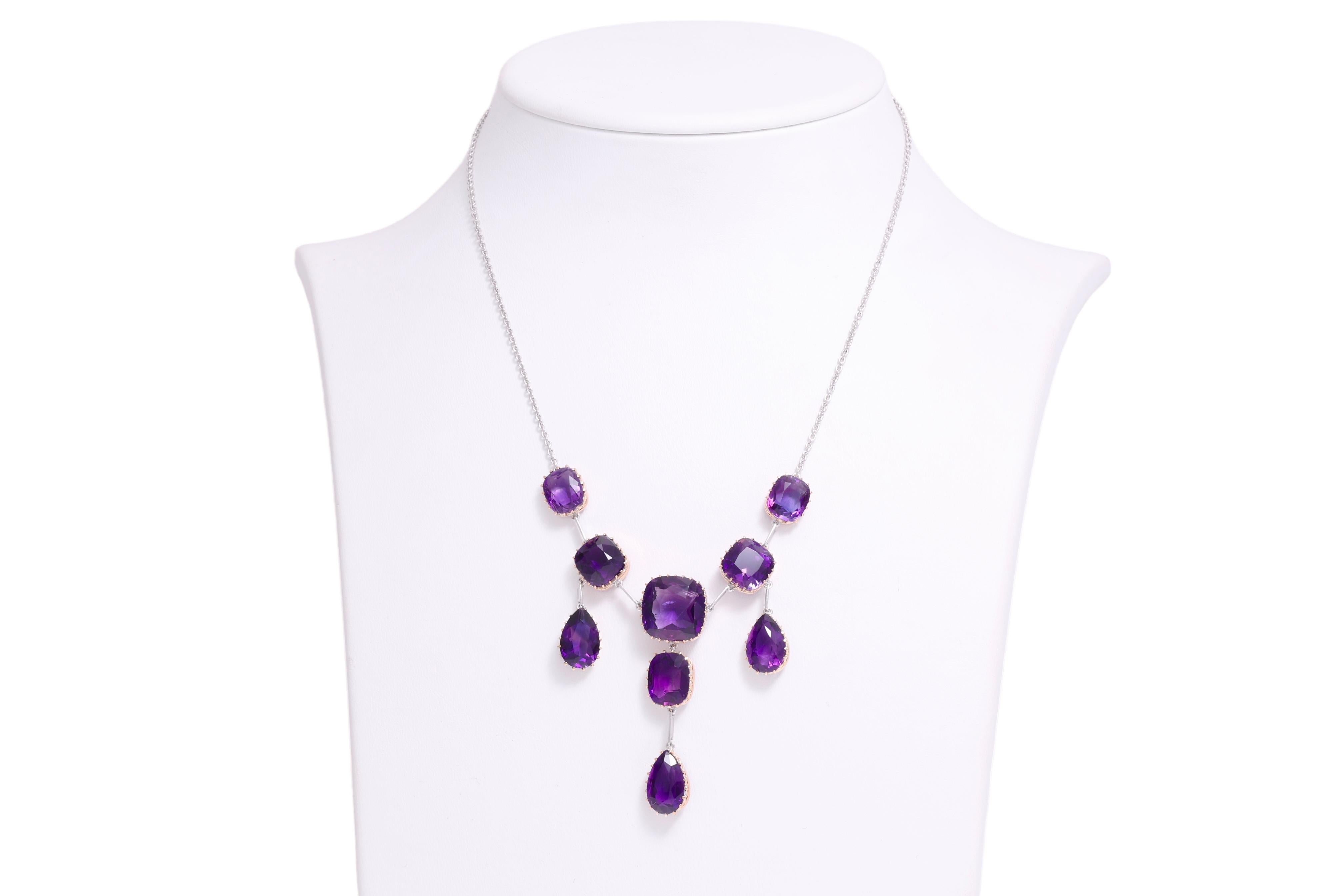 Gorgeous Chandelier Drop Necklace With 55 ct. Amethyst Gemstones

Amethyst: 9 Purple amethyst gemstones together approx. 55 ct.

Material: Platinum chain, 14 kt. Yellow gold pendant 

Measurements pendant: 80 mm x 47 mm
Necklace length: 42 cm

Total
