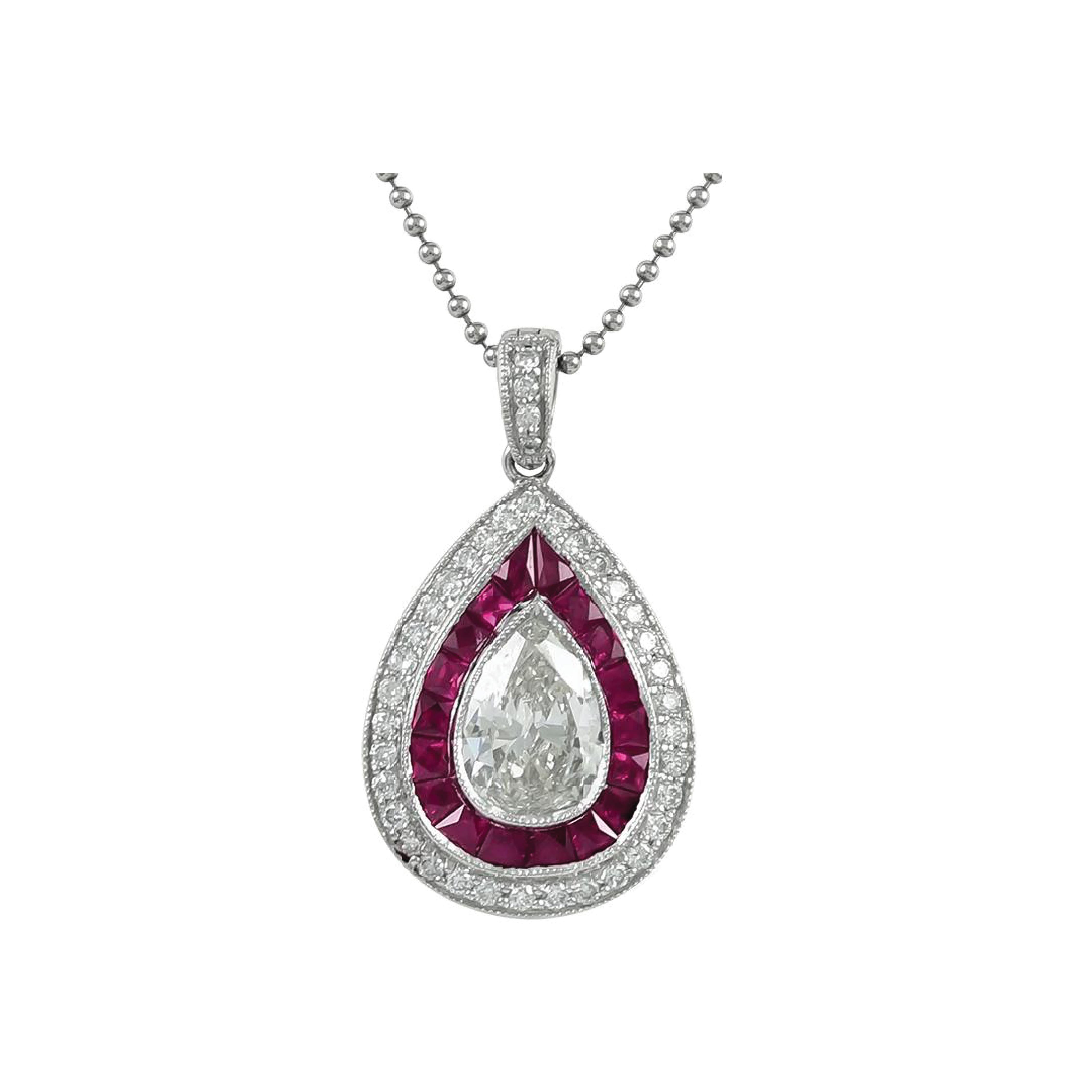 Platinum set pendant and chain with rubies weighing 0.73 carats and center pear shape diamond weighing 1.01 carats and smaller diamonds with a total weight of 0.29 carats.

Sophia D by Joseph Dardashti LTD has been known worldwide for 35 years and