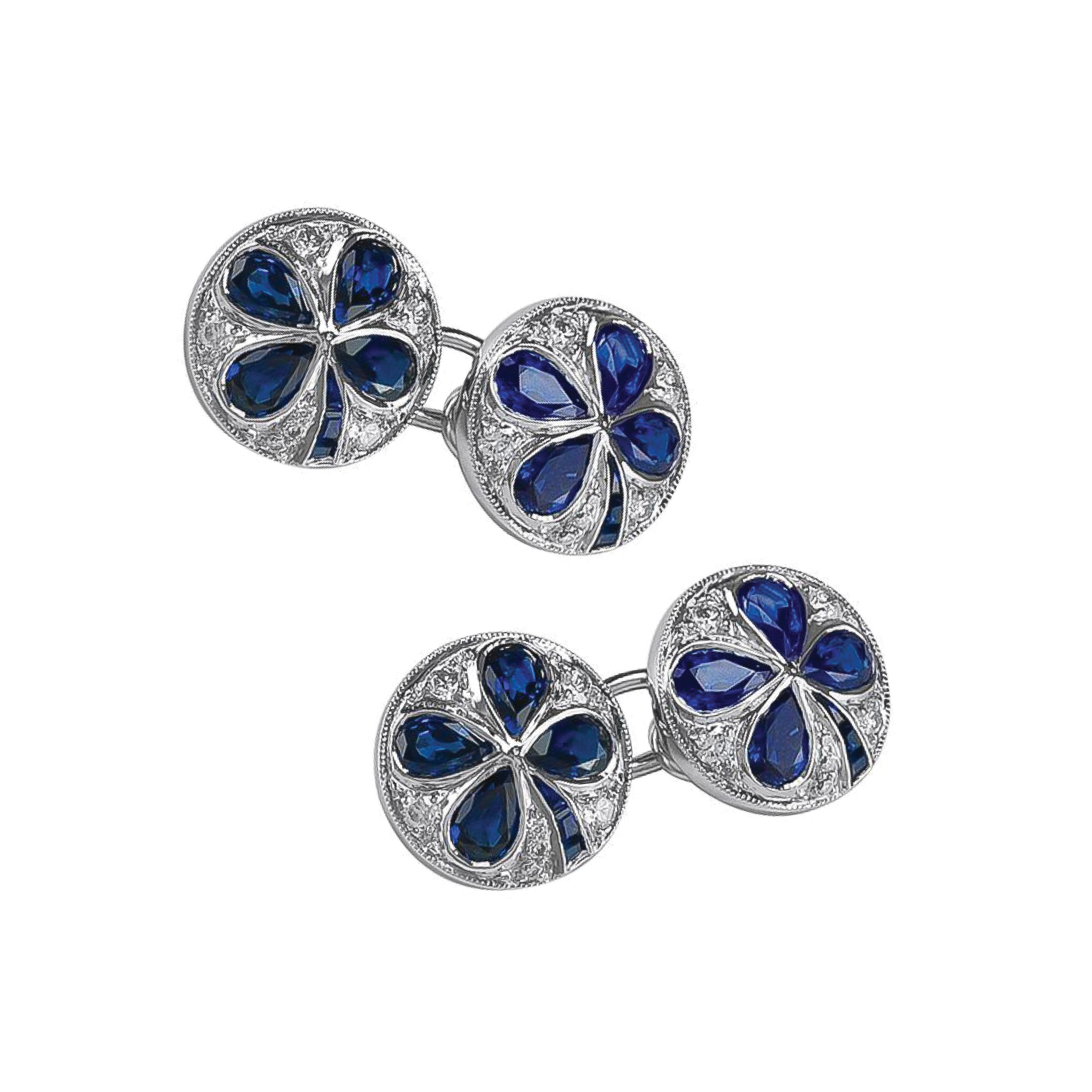 Elegant cufflinks in platinum setting with blue sapphires in clover design weighing 4.74 carats and Diamonds that weigh 0.52 carats.

Sophia D by Joseph Dardashti LTD has been known worldwide for 35 years and are inspired by classic Art Deco design