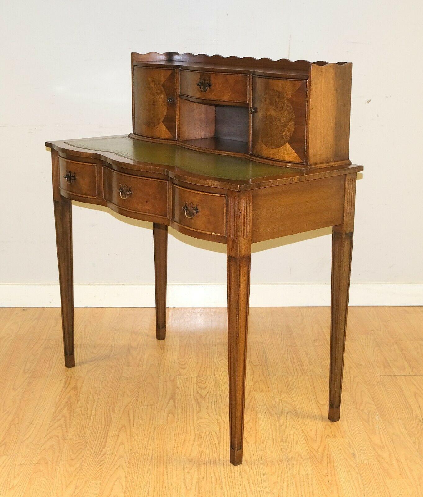 We are delighted to offer for sale this stunning Bevan Funnell Reprox Mahogany writing desk.

This lovely and well made desk offers you three drawers and two cupboards, ideal to keep your papers tidy. The desk stands on tapered and moulded legs,