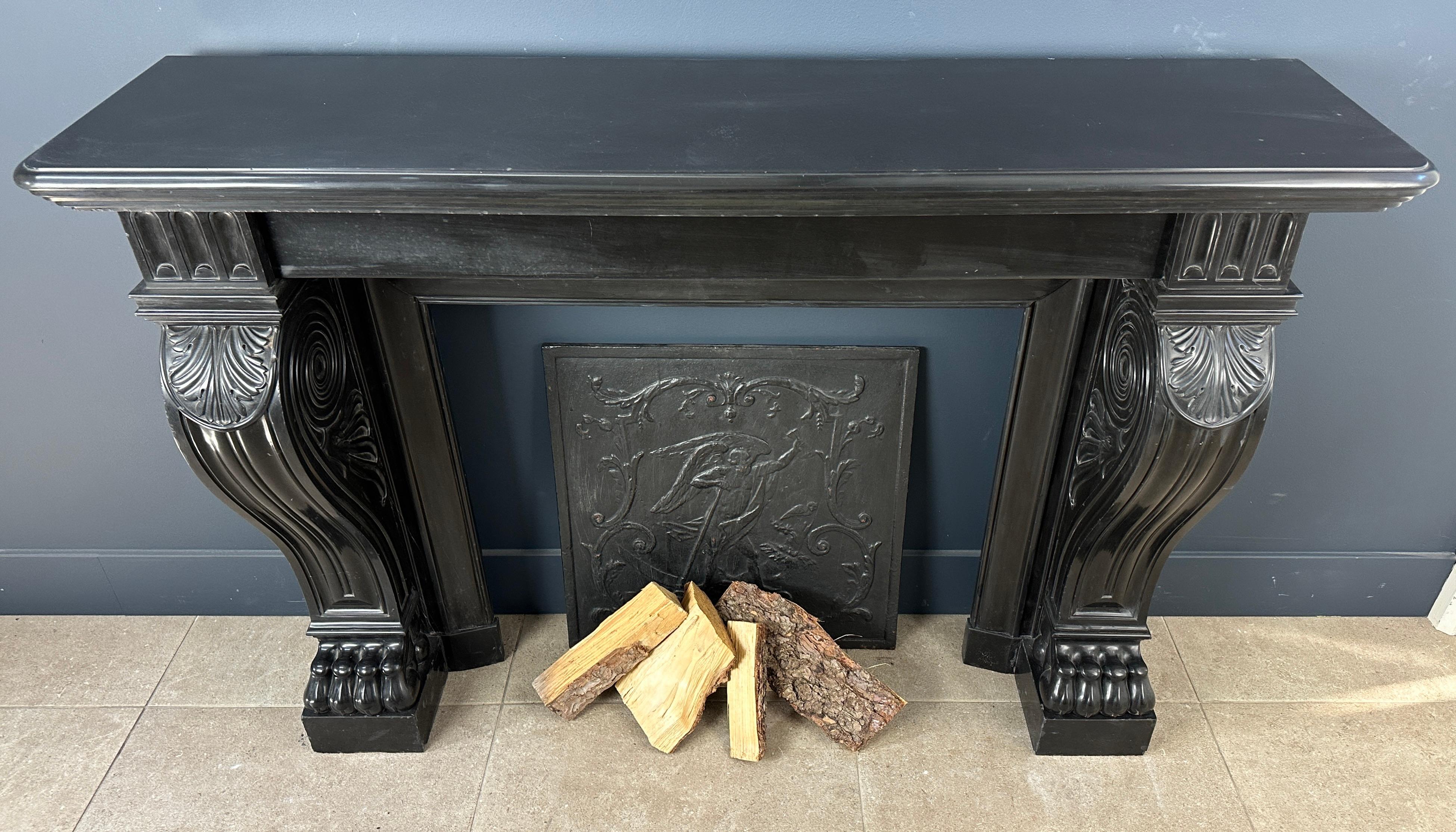 Gorgeous Richly Decorated Front Fireplace Surround in Noir De Mazy Black Marble For Sale 5