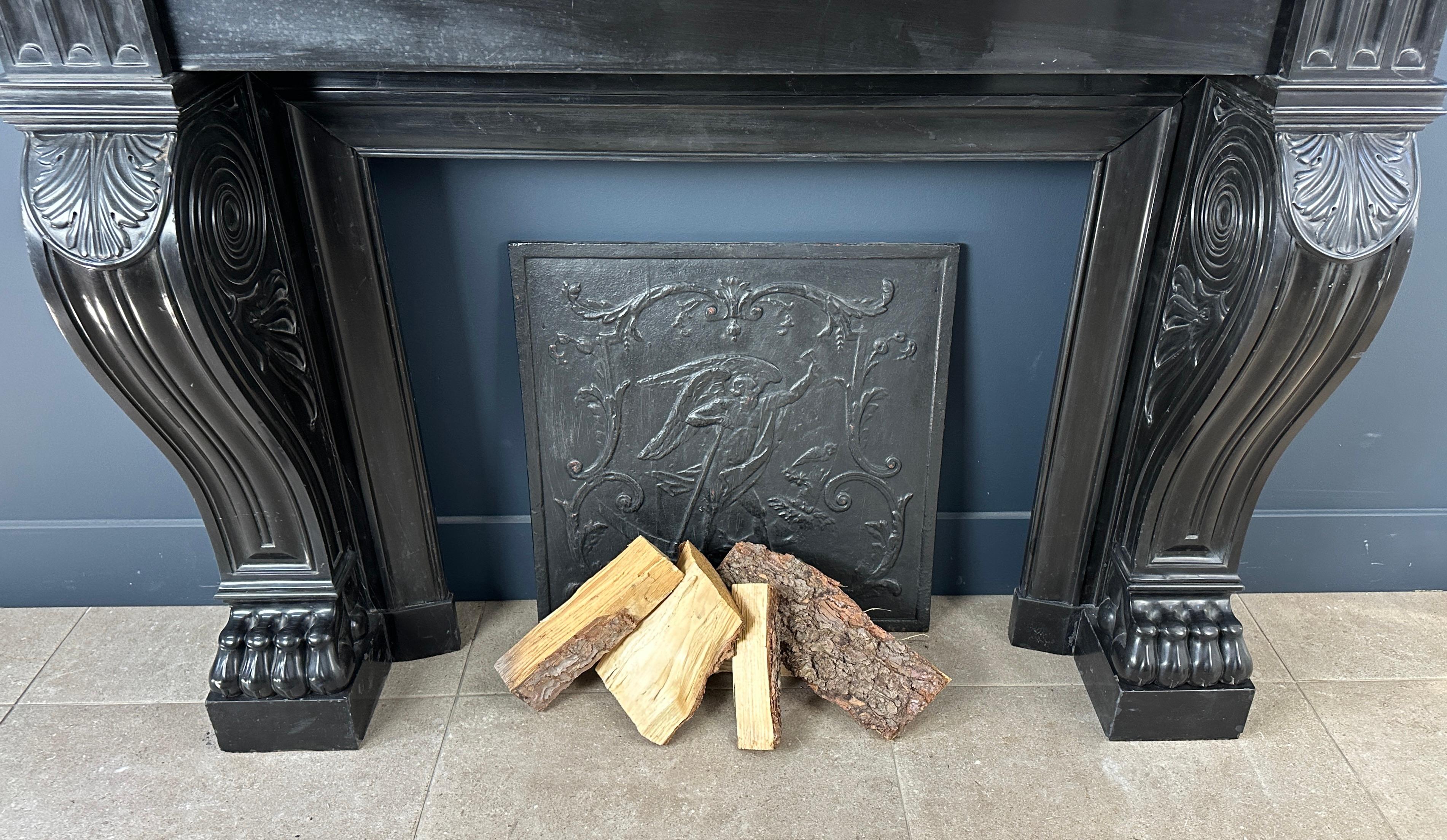Gorgeous Richly Decorated Front Fireplace Surround in Noir De Mazy Black Marble For Sale 8