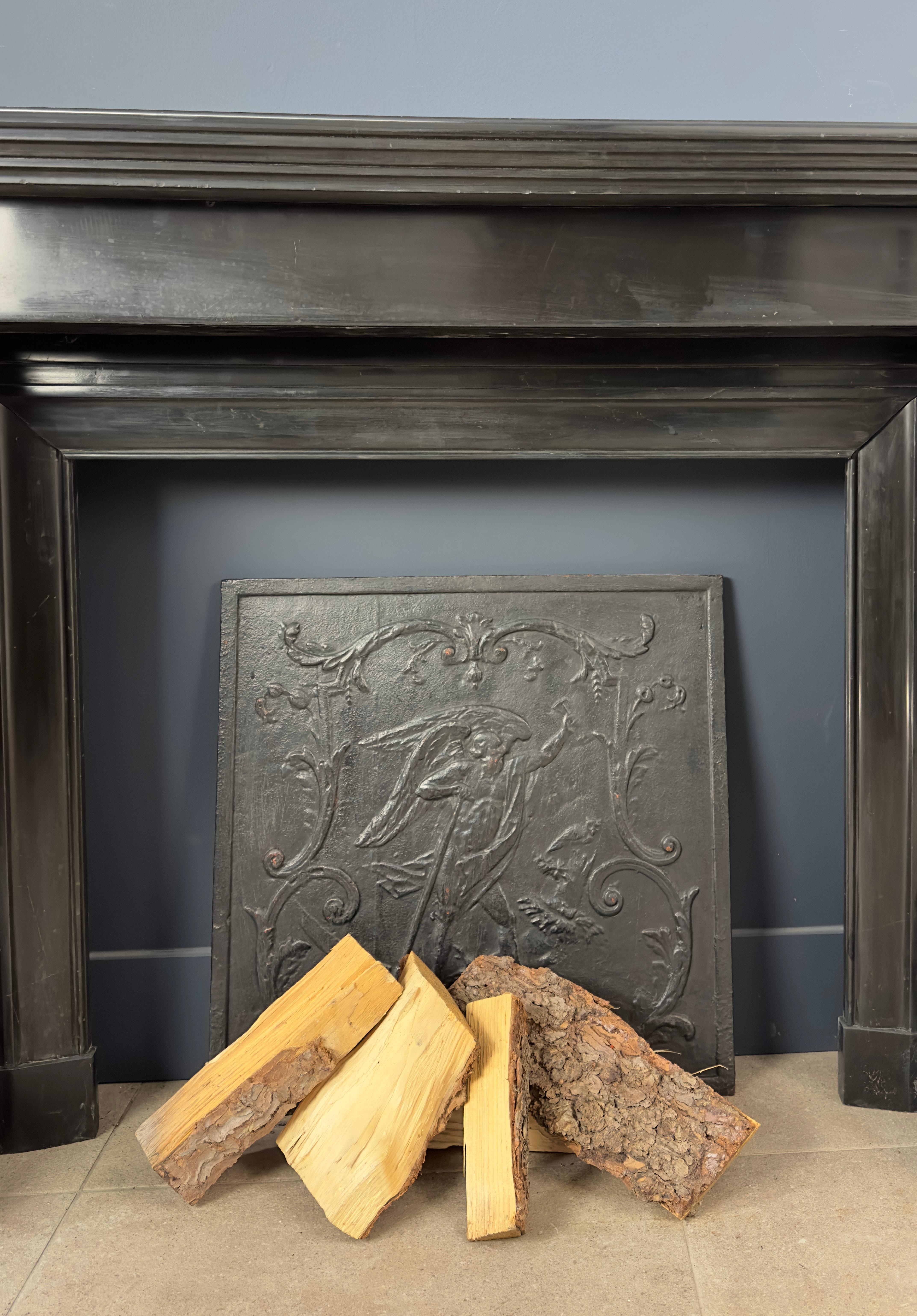 Napoleon III Gorgeous Richly Decorated Front Fireplace Surround in Noir De Mazy Black Marble For Sale