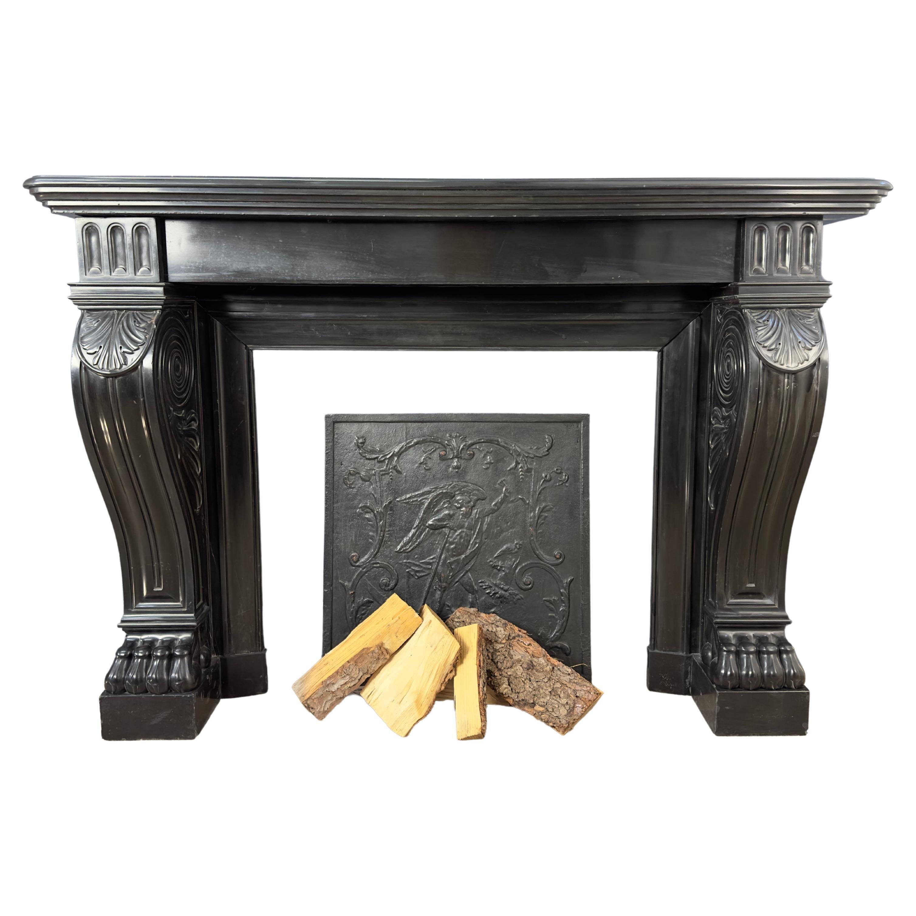 Gorgeous Richly Decorated Front Fireplace Surround in Noir De Mazy Black Marble For Sale