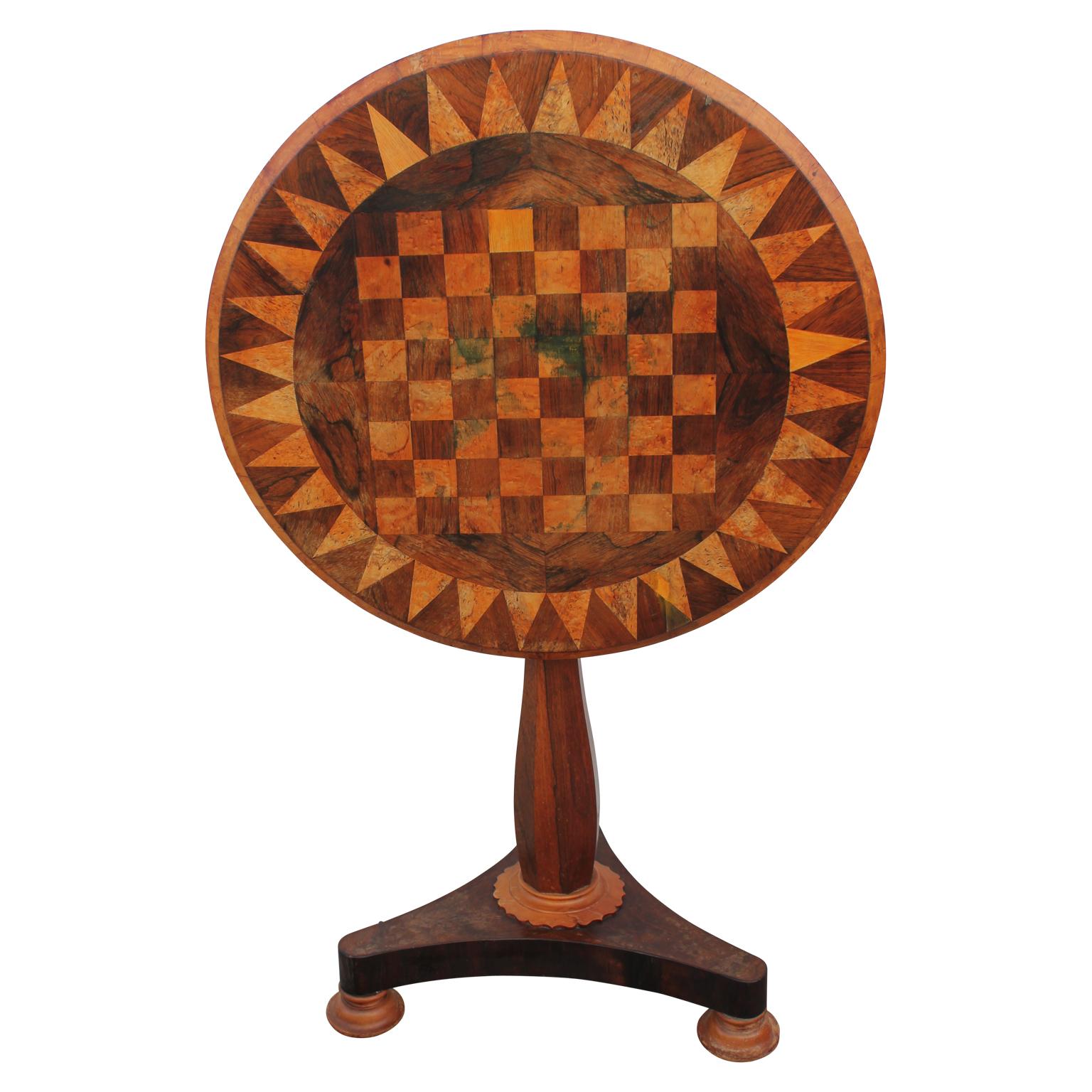 Beautiful round empire tilt top parquetry game or chess table. Visible ink stains on top of table (pictured),

circa 1840s.