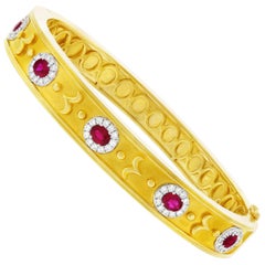 Gorgeous Ruby and Diamond set Gold Bangle by Spark Creations