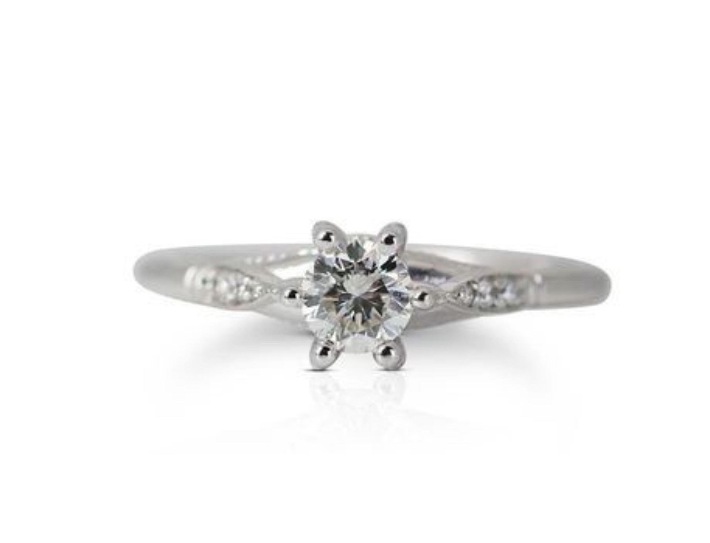 Gorgeous Solitaire Ring in 14k White Gold

At the heart of this ring is a dazzling solitaire diamond, meticulously chosen for its exceptional quality and brilliance. The solitaire setting highlights the innate beauty of the diamond, allowing it to