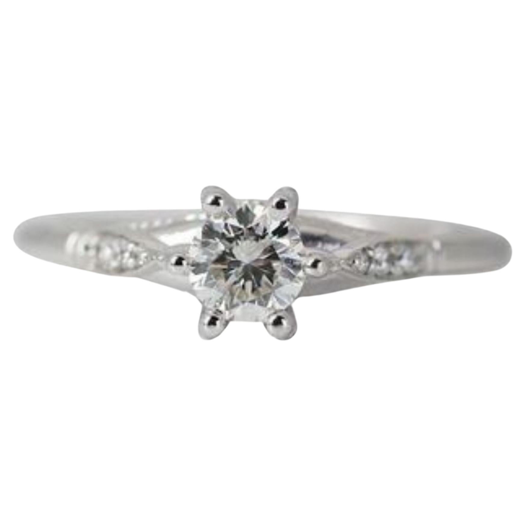 Gorgeous Solitaire Ring in 14k White Gold For Sale