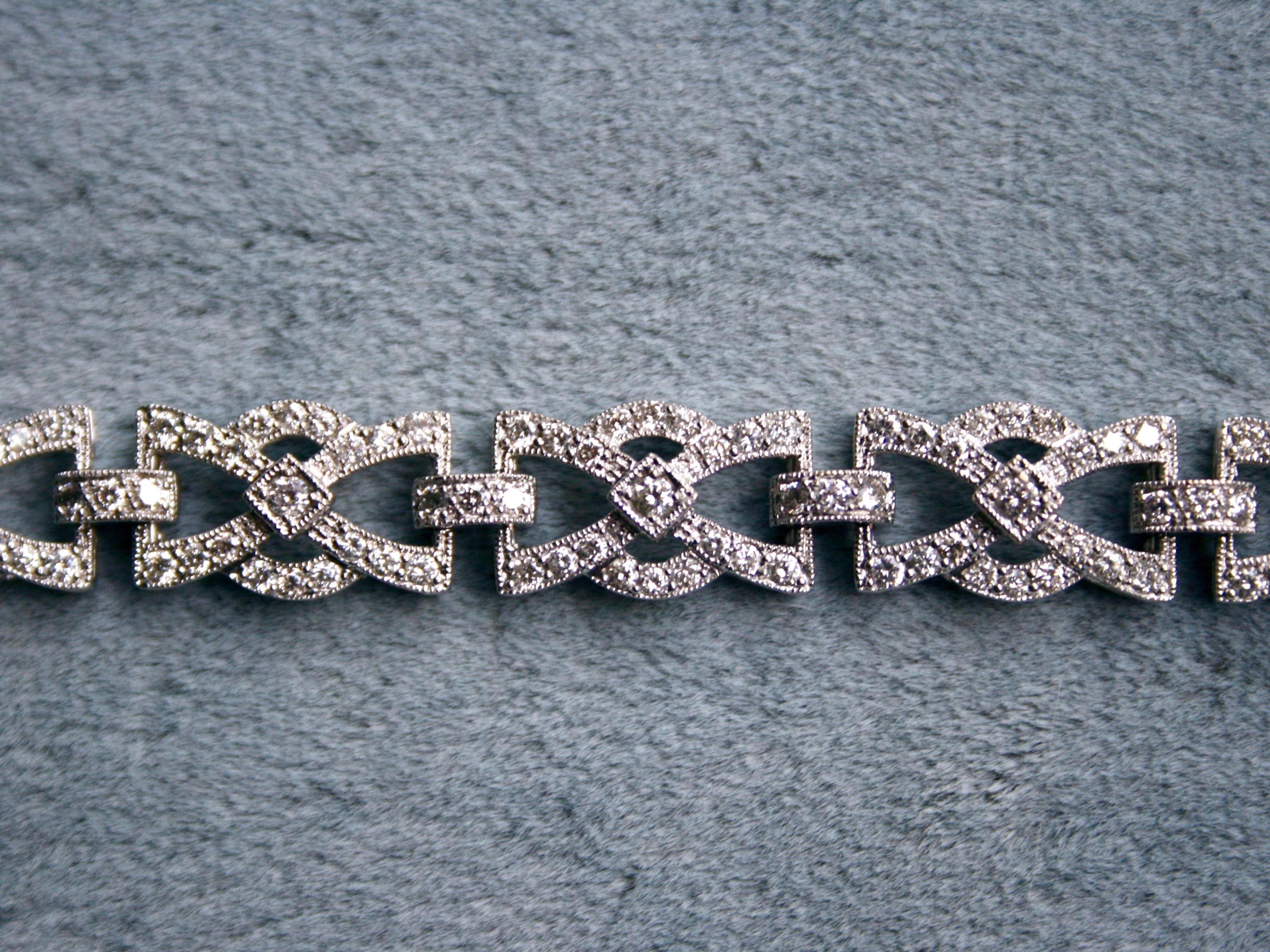 So gorgeous! The design of this Sparkly 18K White Gold Diamond Fancy Bracelet is just beautiful! Crafted in 18K White Gold, this stunning bracelet features a total of 242 Round Brilliant Cut Diamonds, totaling approximately 2.87ct, of H/VS2