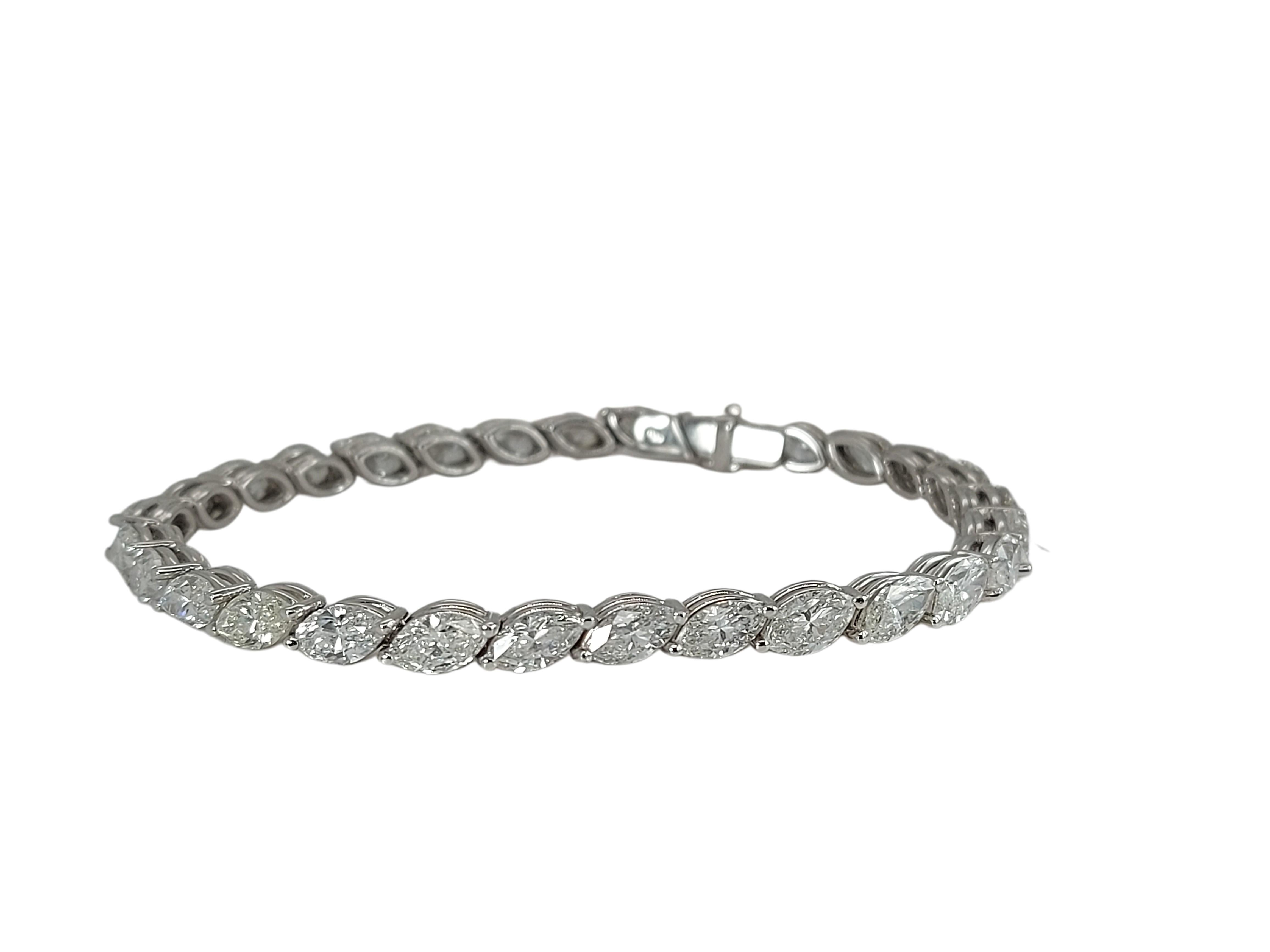 Gorgeous Tennis Diamond Bracelet With 29 Marquise Cut Diamonds

Diamonds: 29 Marquise cut diamonds ,11.6 Ct Top Quality

Material: 18kt White Gold

Total weight: 14.1 gram / 0.500 oz / 9.1 dwt

Measurements: Will maximum fit a 16 cm wrist (can be
