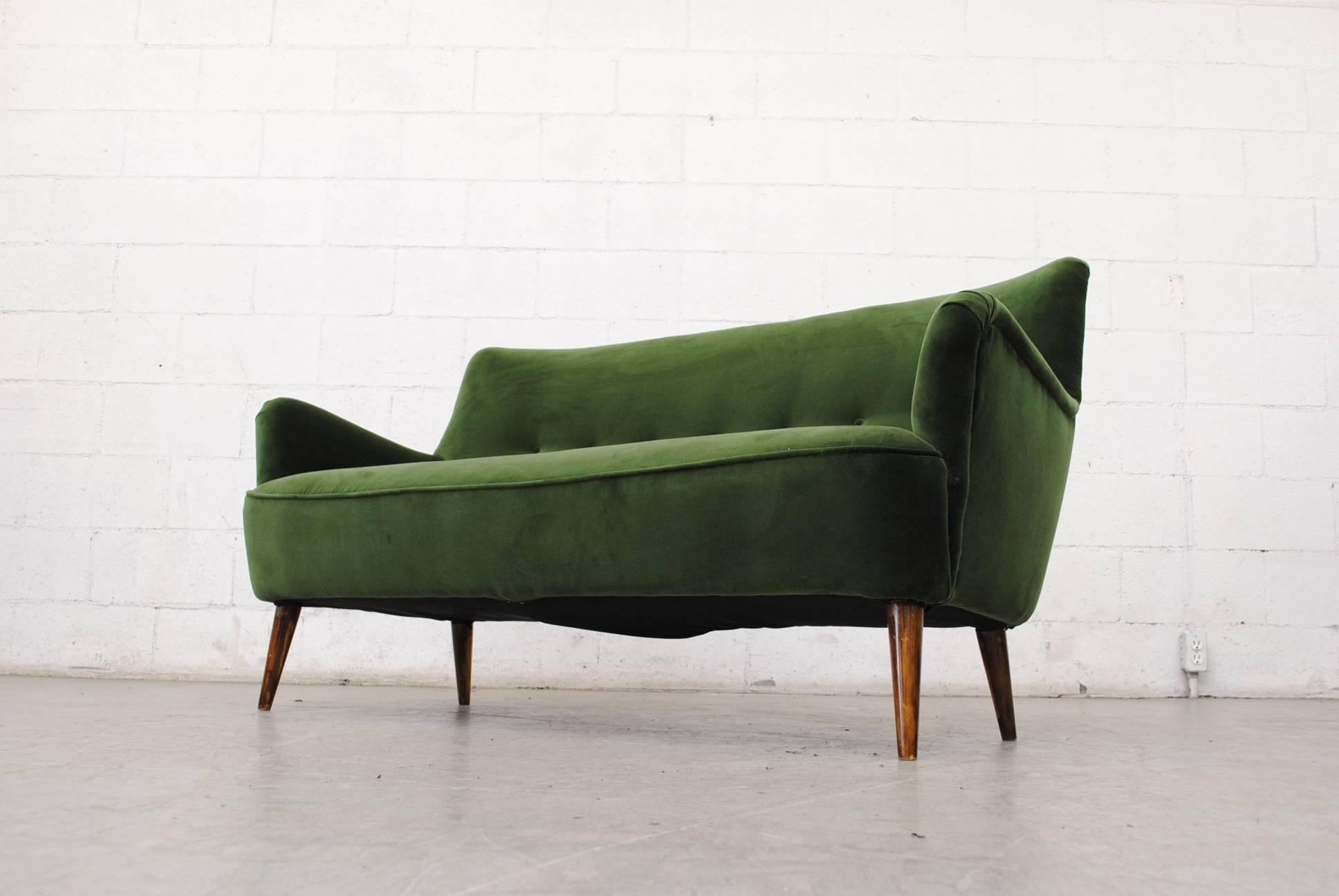 emerald green velvet sofas
