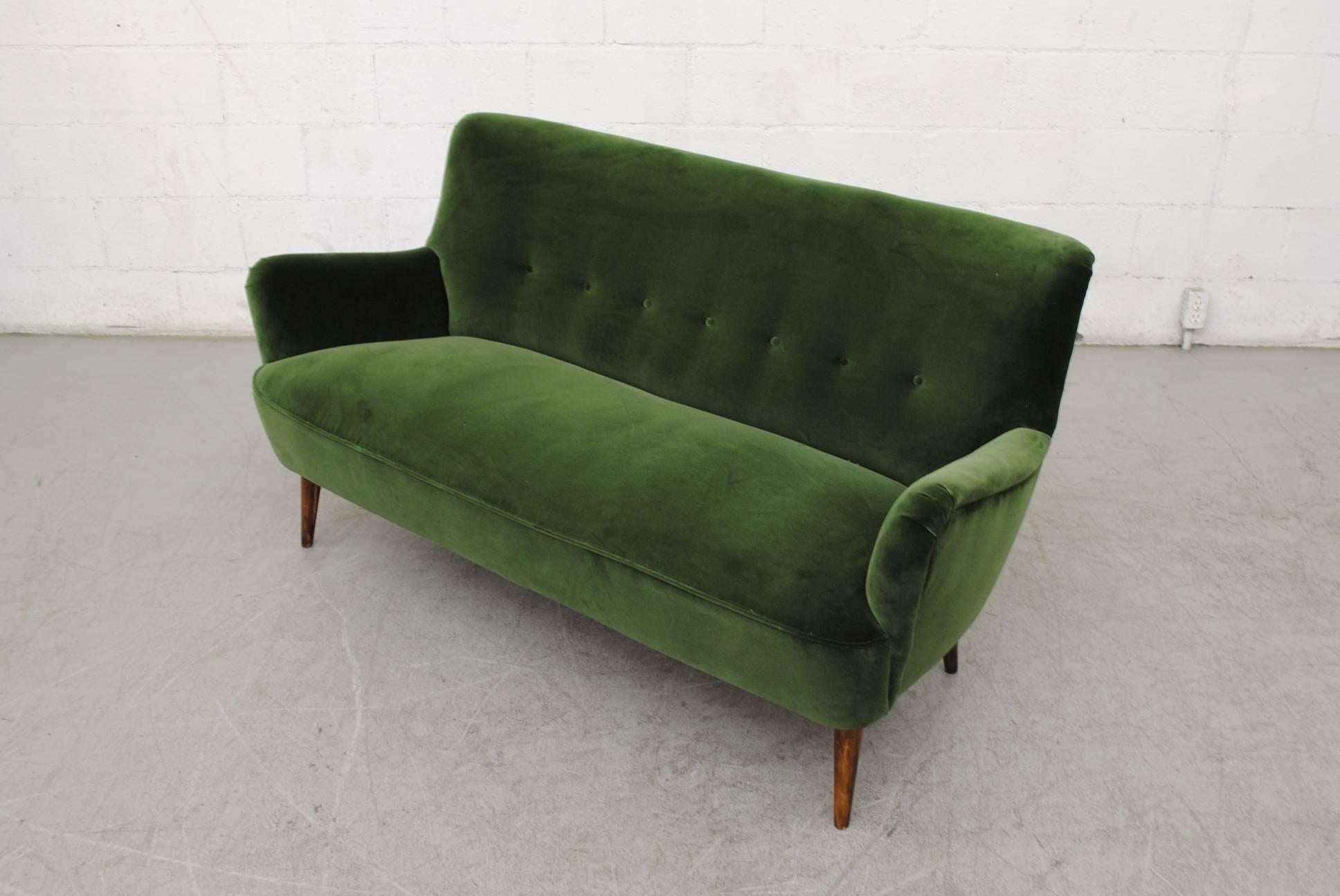 emerald green velvet couch