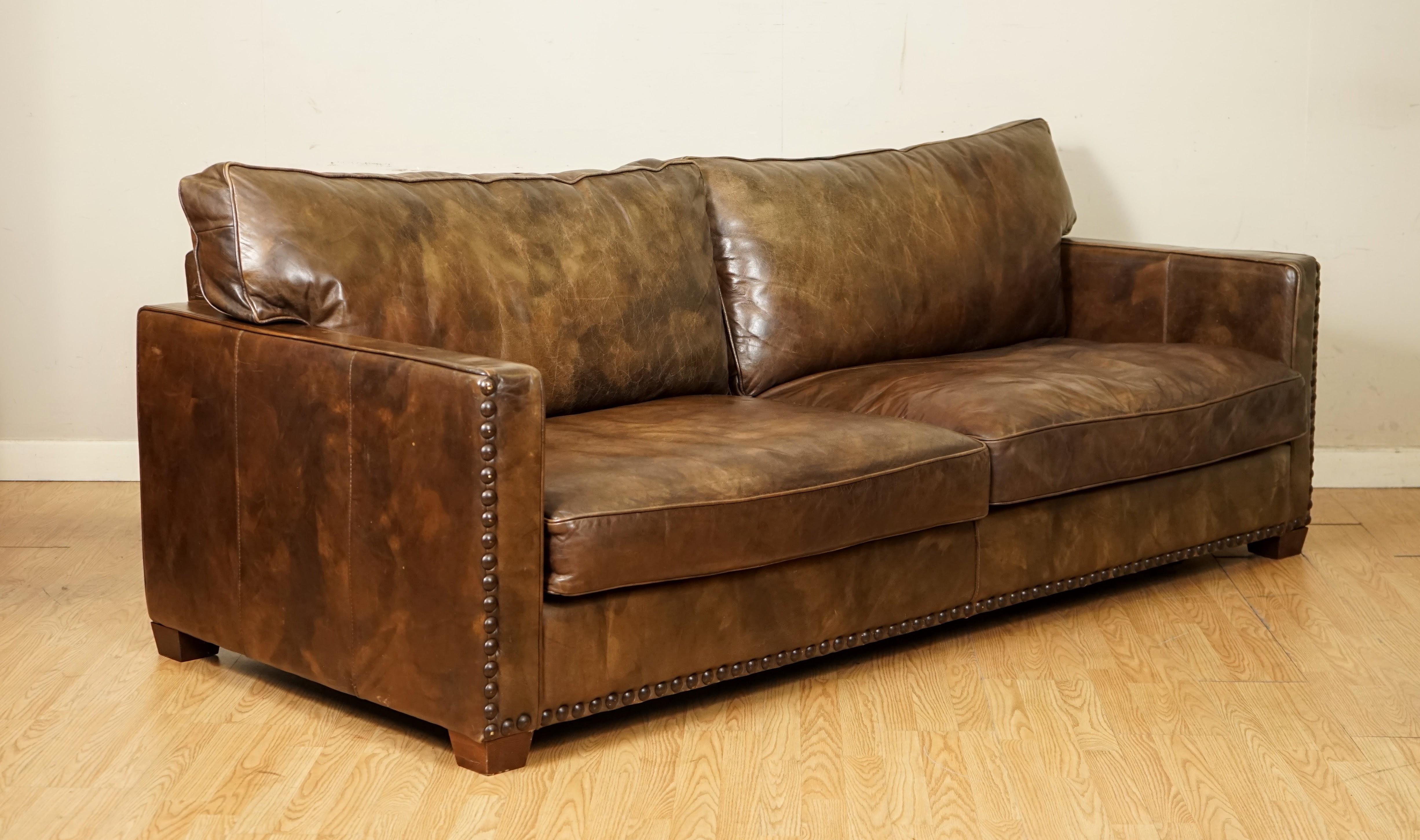 We are so excited to present to you this Gorgeous Timothy Oulton Heritage Brown Leather Sofa.

The Viscount William range is a true Timothy Oulton Classic, looking comfortably at home everywhere from modern loft apartments to more traditionally