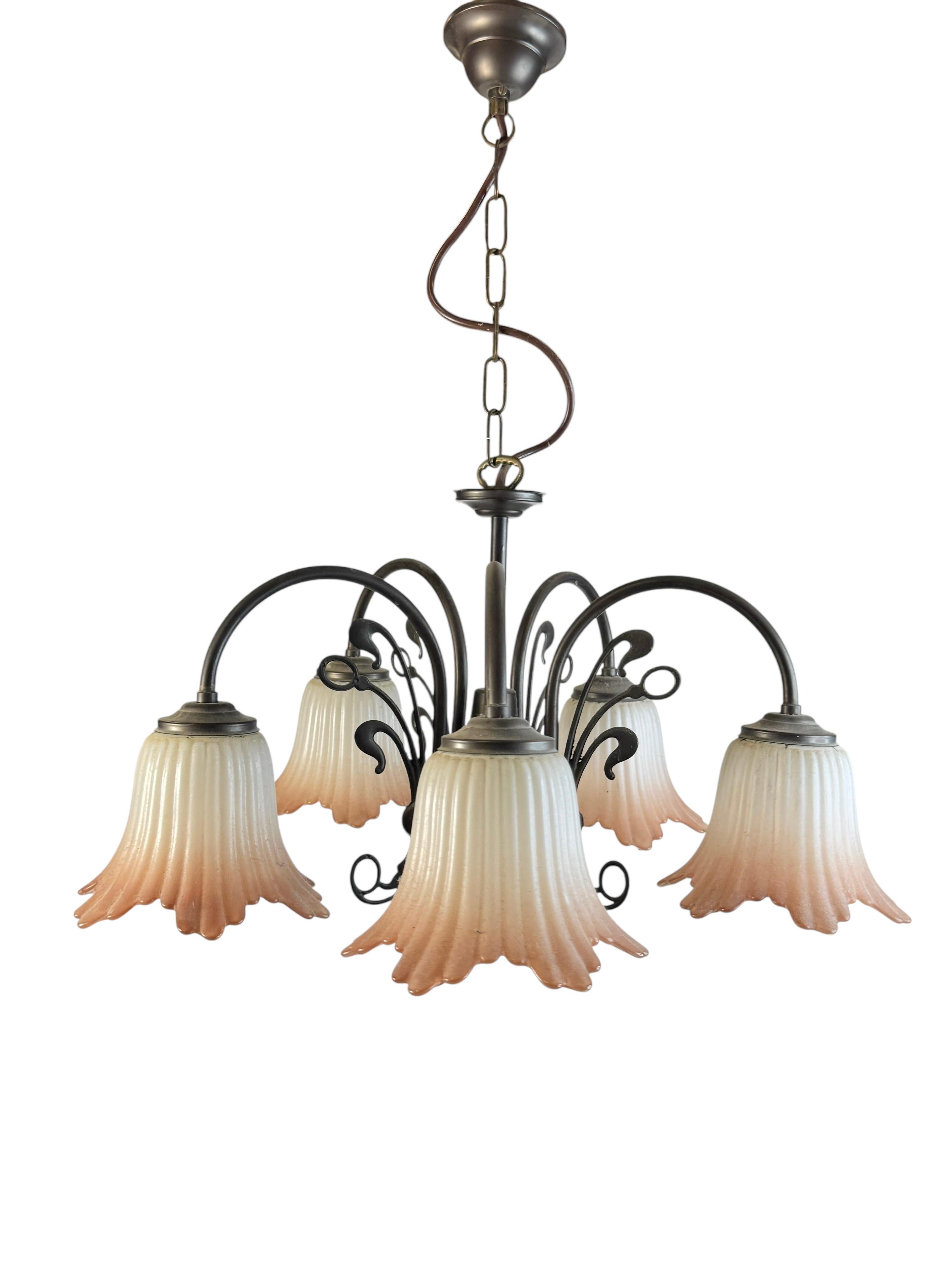 Petite Florentine style five-light chandelier. The Fixture requires five European E14 / 110 Volt Candelabra bulbs, each bulb up to 40 watts. Beautiful metal chandelier with flower glass shades. It gives a very warm light and represents the Italian