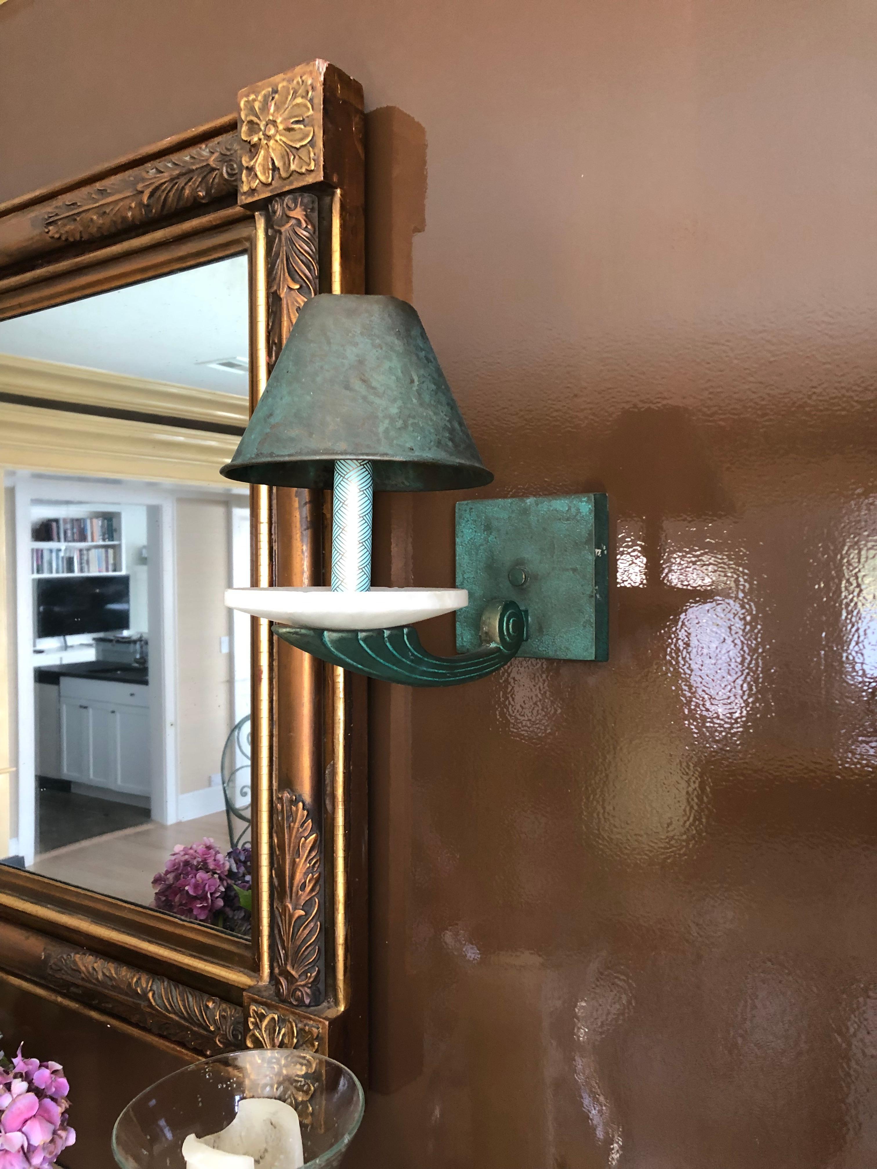 Marvelous verdigris copper wall sconce--4 are available-- a gorgeous shade of turquoise with lovely alabaster saucers. Priced individually, but will give a good discount if purchasing all 4.