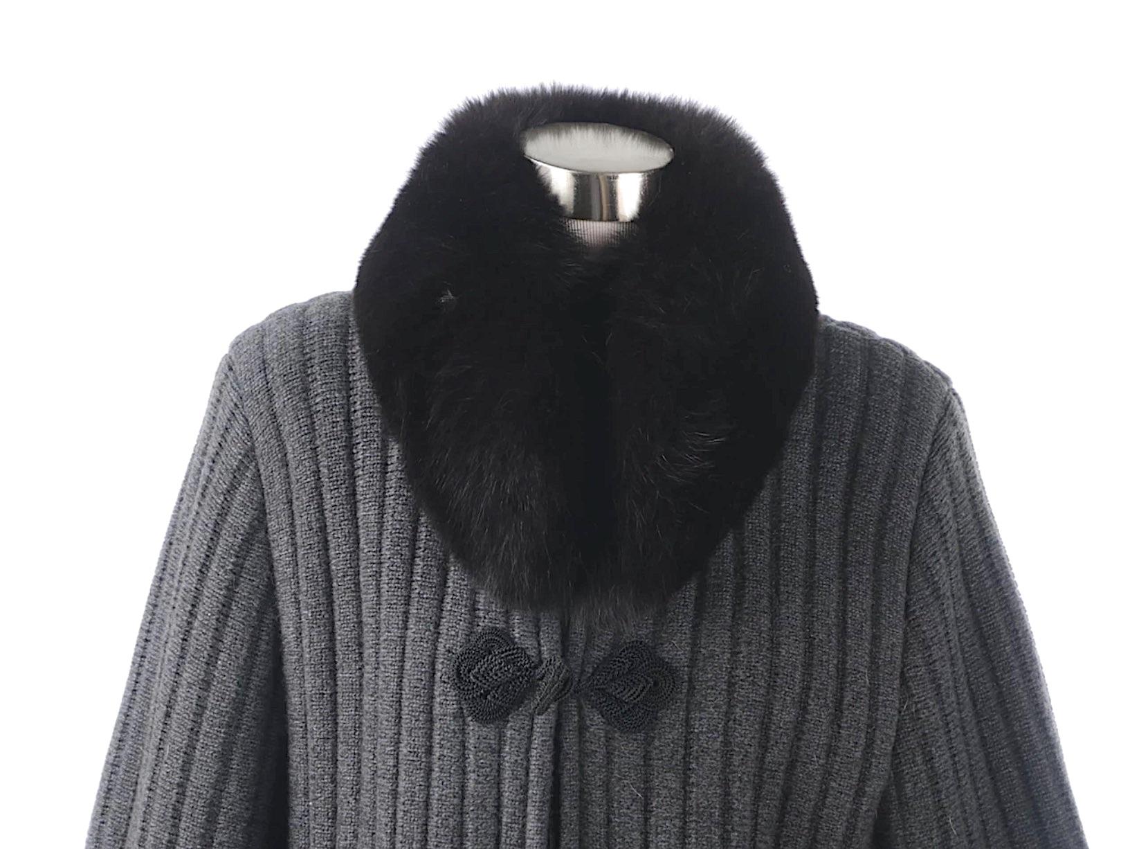 This is the ultimate Haute Couture Valentino Fur Sweater Jacket for a Stylish Fashionista!
Gorgeous Valentino Lush Black Fox Fur trimmed around the Collar, Sleeves and Bottom with a Grey Ribbed Wool Knit Sweater Jacket. 
From the Valentino Night