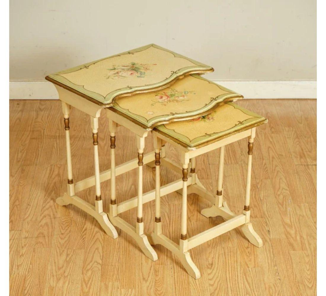 We are delighted to offer for sale this outstanding french hand-painted floral nest of tables.

All the tables have been hand-painted, and on all tops, some beautiful flowers are presented, followed by some gold leaf.

On the medium table, there