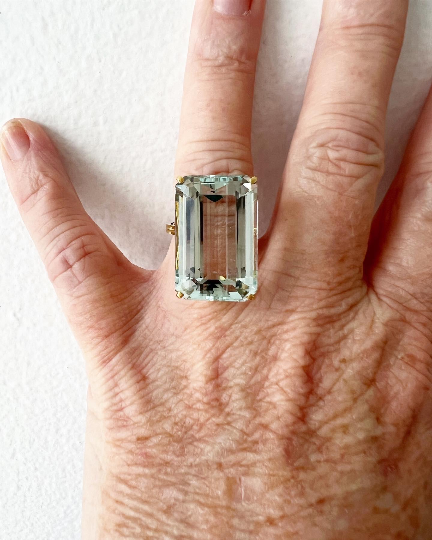Hello gorgeous! This gorgeous Vintage Aquamarine Ring truly is a special (and very big!) piece! Crafted in 14K Yellow Gold, the design is a classic basket holding a stunning natural Aquamarine. The stone itself is approximately 30.00 carats (yes,