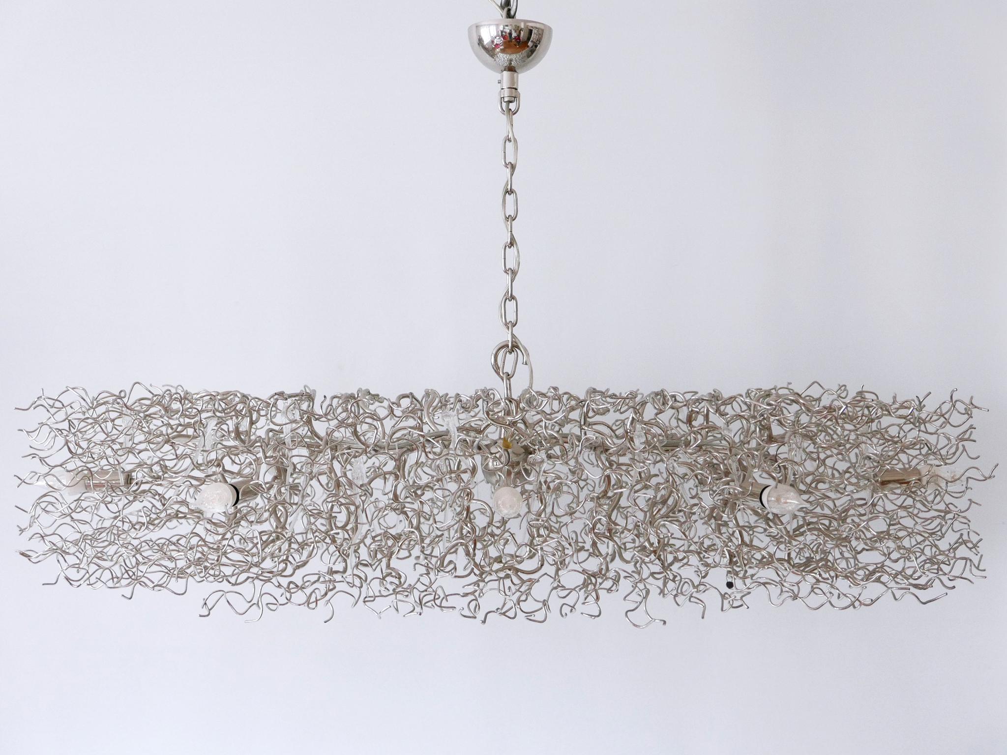 Gorgeous, very decorative and large eight-flamed chandelier or pendant lamp. Model 