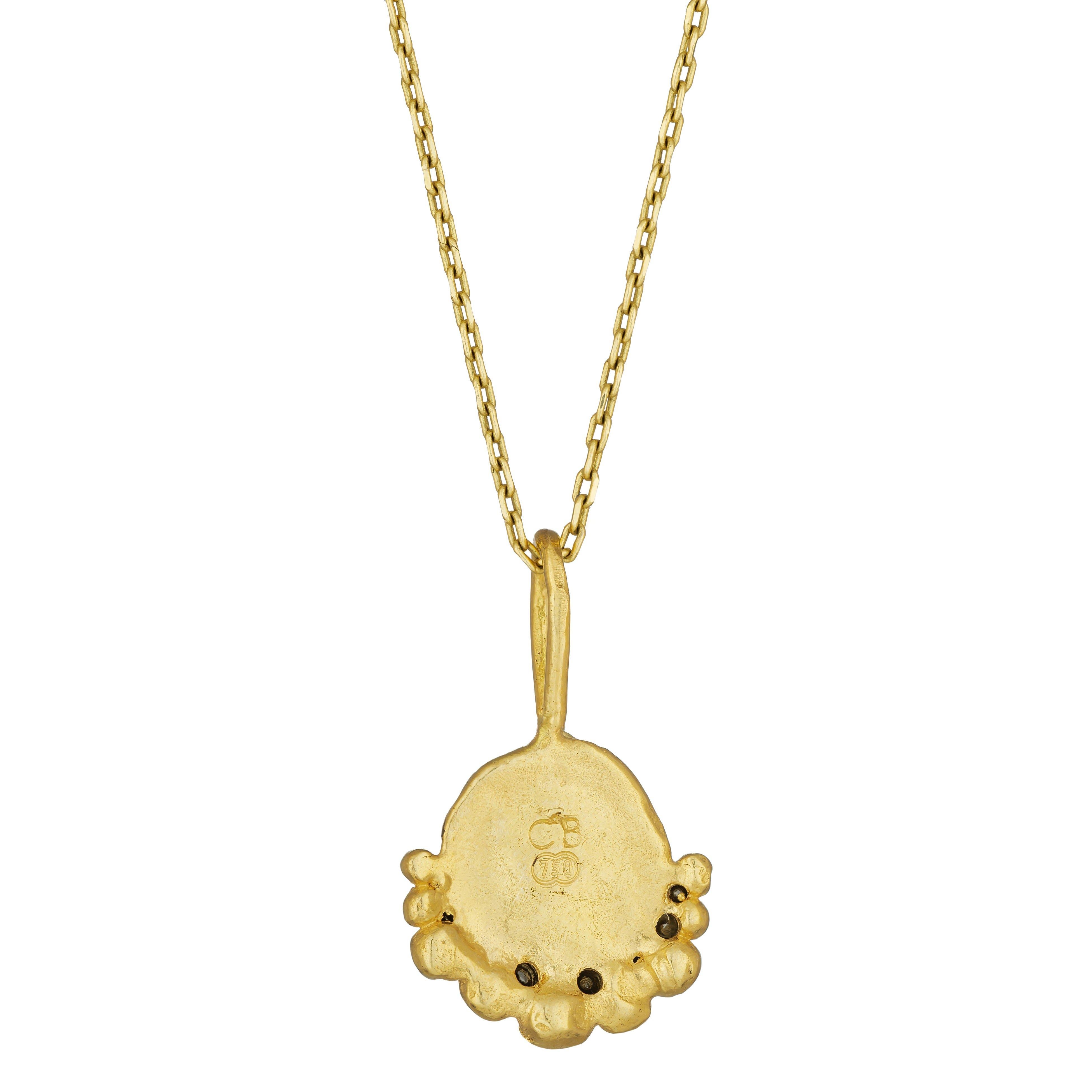 Gorgoneion Radiance Pendant with Black Diamonds, 18 Karat Yellow Gold
Handcrafted and individually cast in 18-karat solid yellow gold. Olivia carves each piece from wax, making these pendants unique, which we believe is what gives them their beauty.
