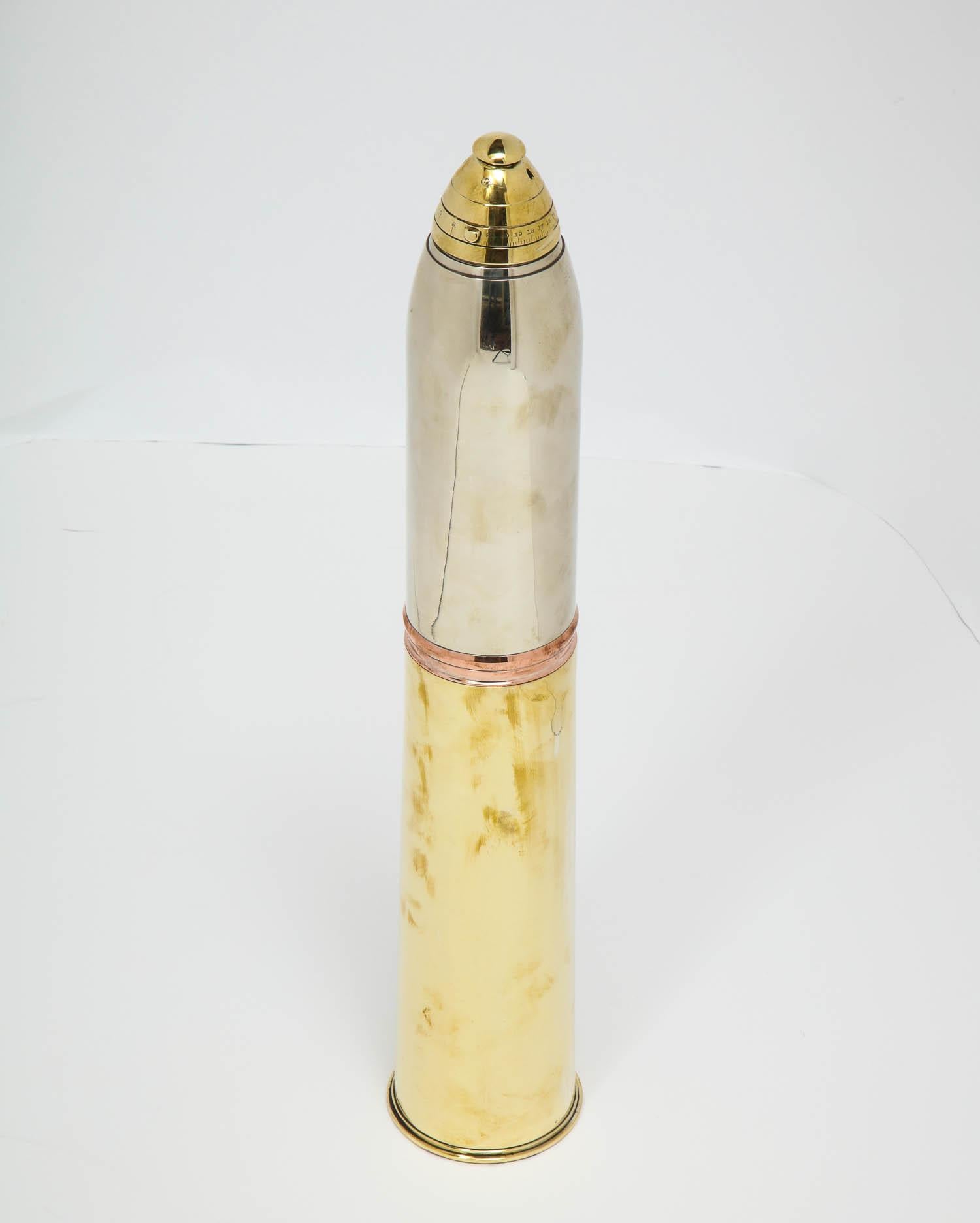 Gorham, a rare artillery shell cocktail shaker, circa 1918

Made by the Gorham Silver Company, with all of its original parts. This shaker is one of the tallest ever produced and, as a drink-making kit, it is a model of efficiency. Very tall and