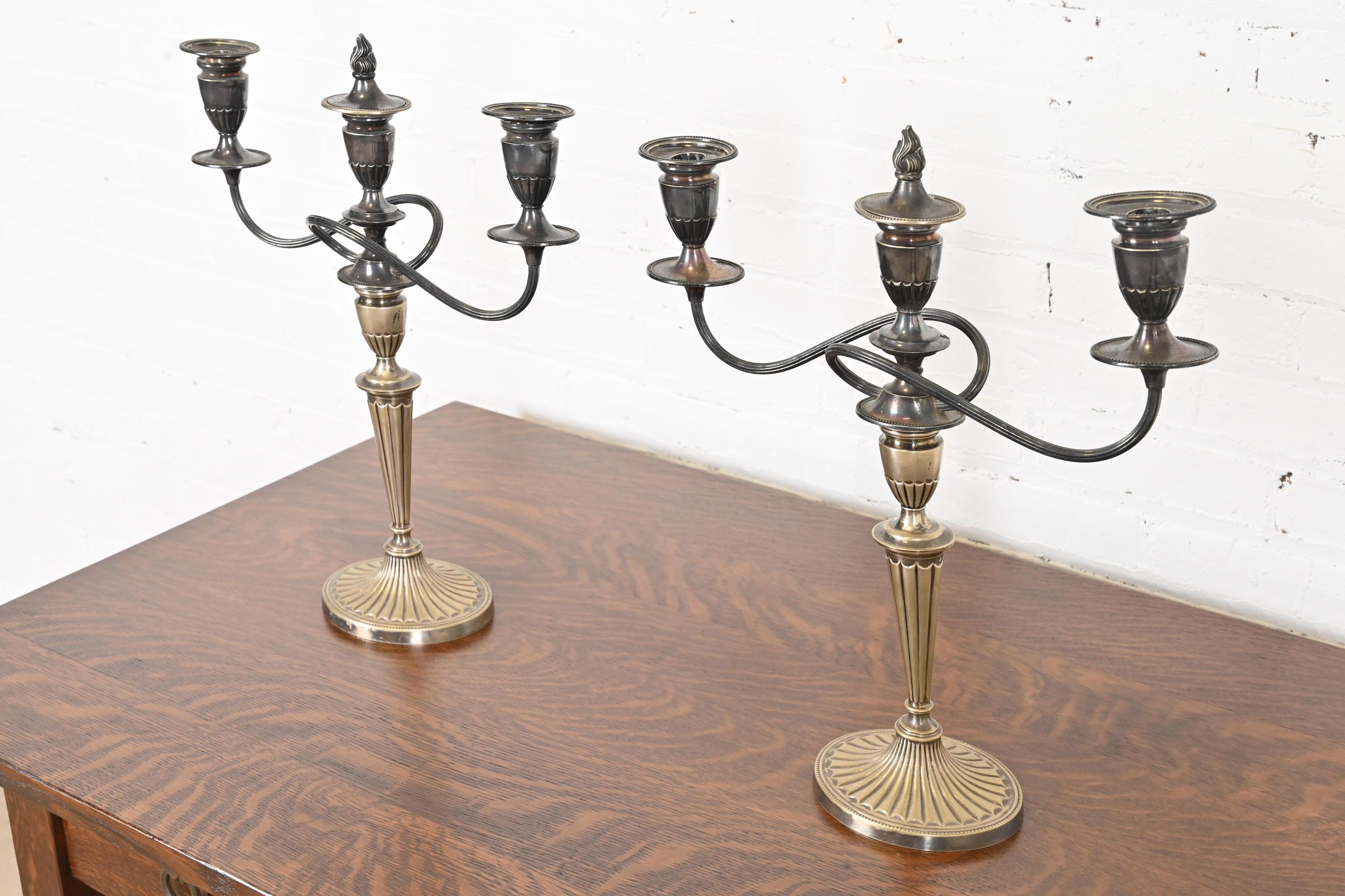 A gorgeous pair of antique silver plate two-light candelabra

By Gorham for Black, Starr and Frost

England, Circa Late 19th Century

Each measures: 16.5
