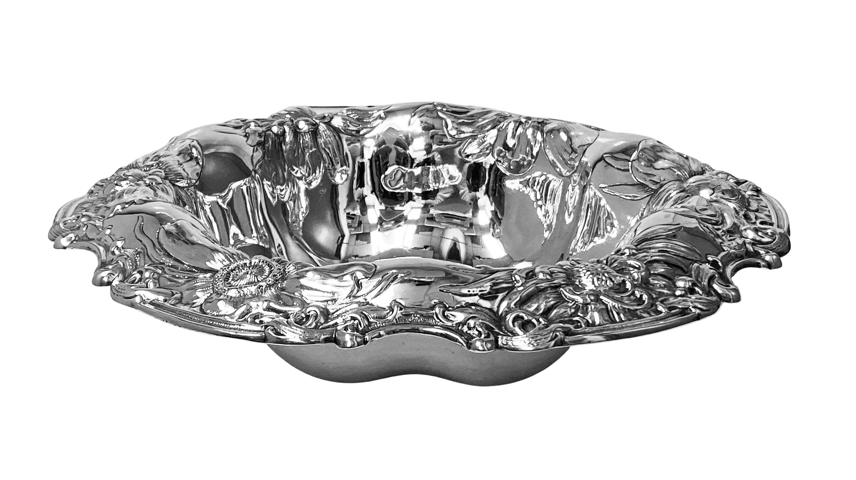 Gorham large Art Nouveau sterling silver Floral decorated bowl C.1900. The deep bowl of round scalloped form beautifully embossed and chased with overlapping floral decoration. Full Gorham marks to underside and numbered 816C. Measures: Diameter: 12