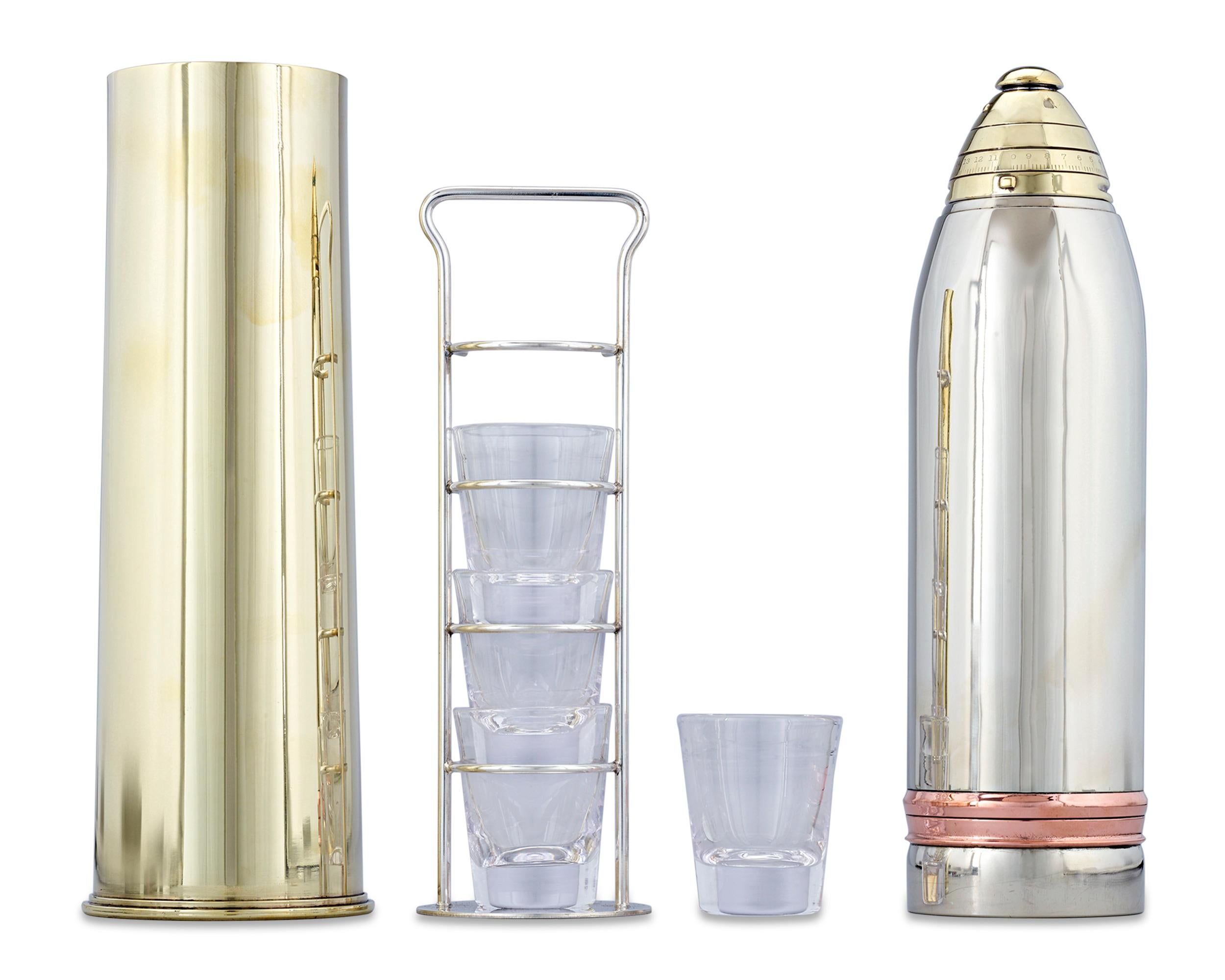 This incredibly rare artillery shell cocktail shaker, crafted by the Gorham Silver Company, is one of the very few remaining of its kind with all of its original parts. Sleek and aerodynamic, the shaker is one of the tallest ever produced and, as a