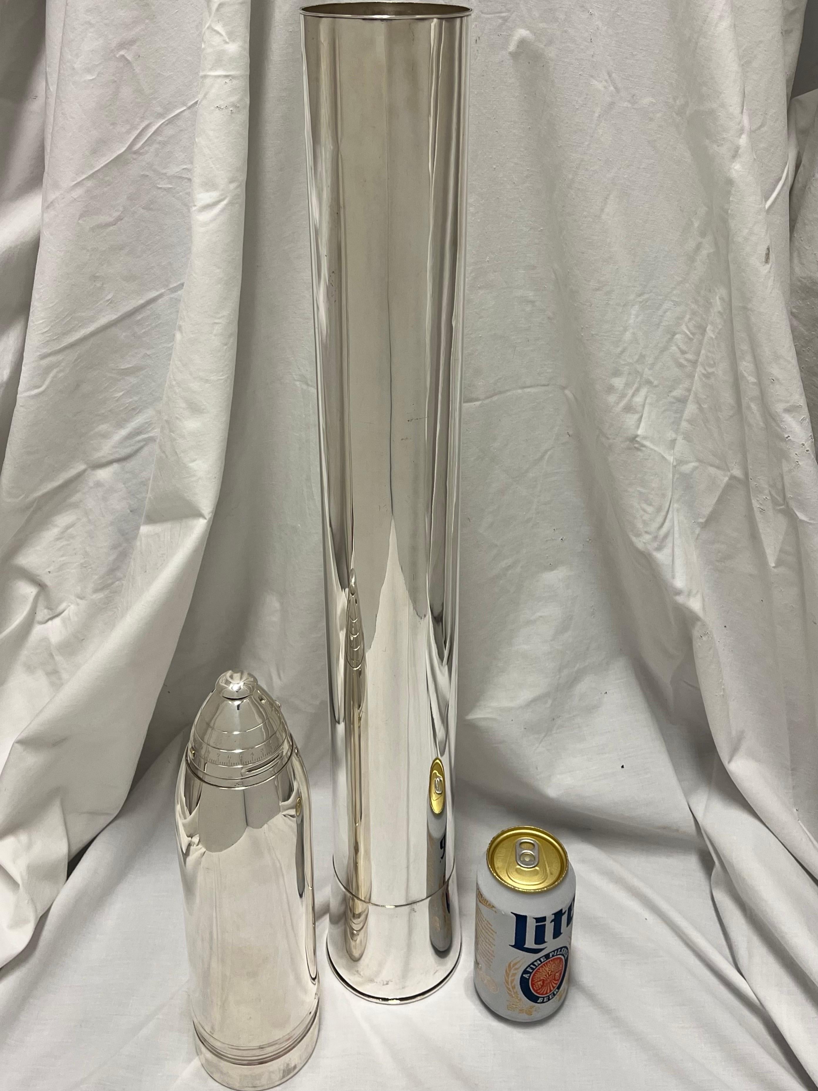 A rare, unique and monumental three foot tall silver plate cocktail shaker by (possibly attributed to) Gorham in the form of a World War I era facsimile eighteen pound shrapnel artillery shell. This shaker dates to circa 1916 - 1920. This completely