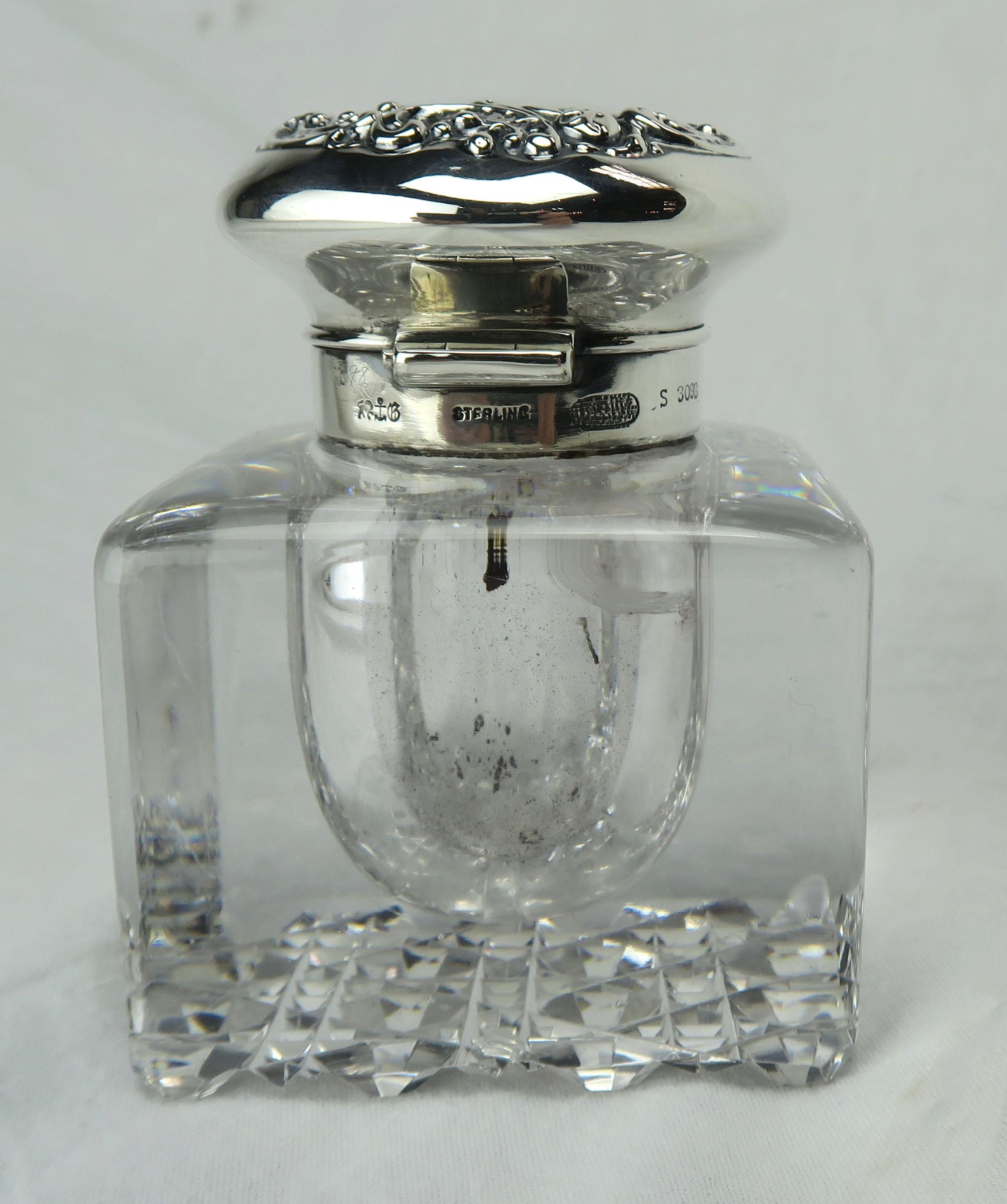 Gorham Silver company cut crystal and sterling silver ink-well with Hallmark stamped on lid.

Condition: Notes excellent overall condition with tiny chip on edge of underside-did not even notice-but you can slightly feel it upon touch.



   