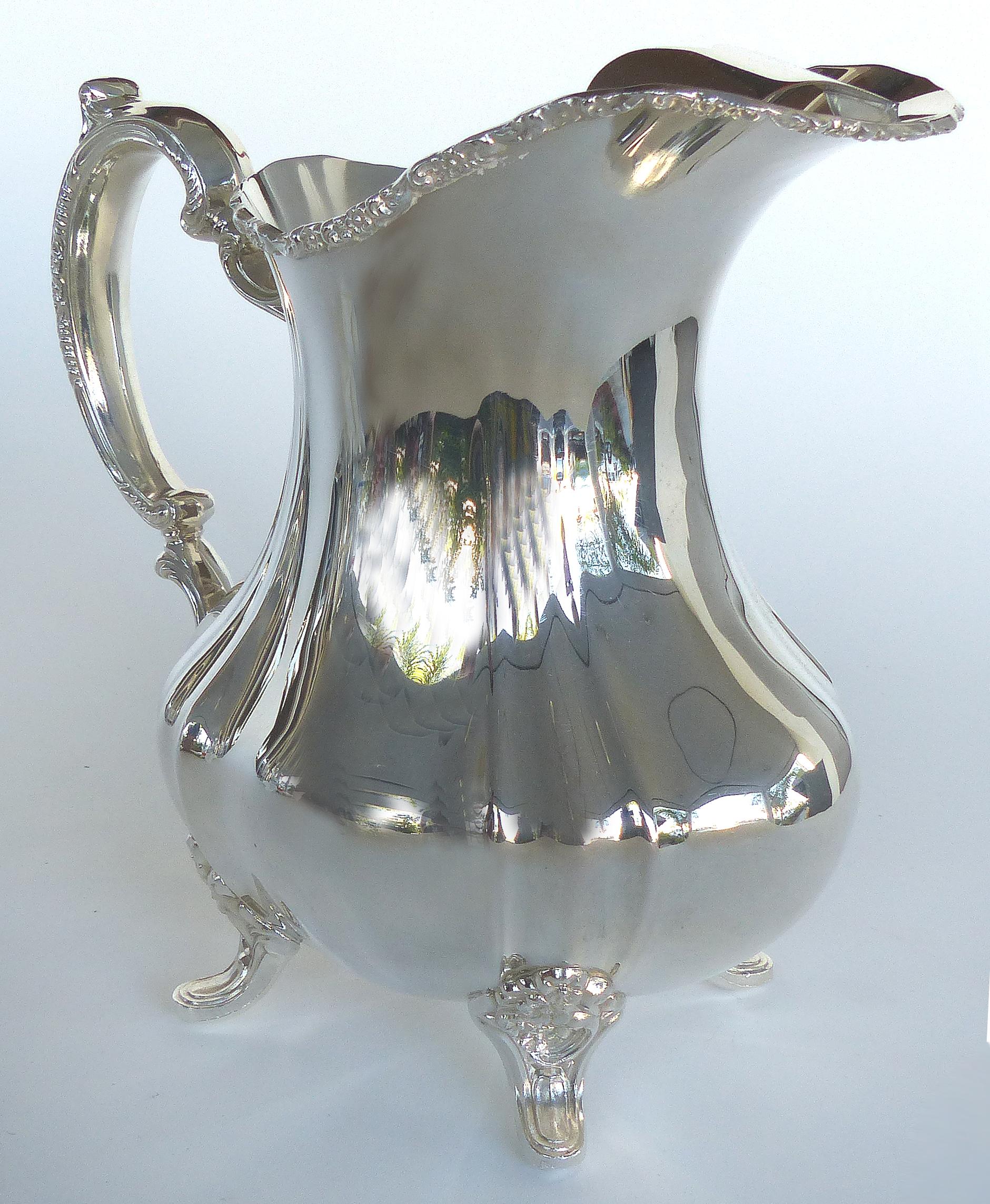 Offered for sale is a Gorham electroplated nickel silver footed water pitcher. The pitcher has an ice lip and is marked underneath.