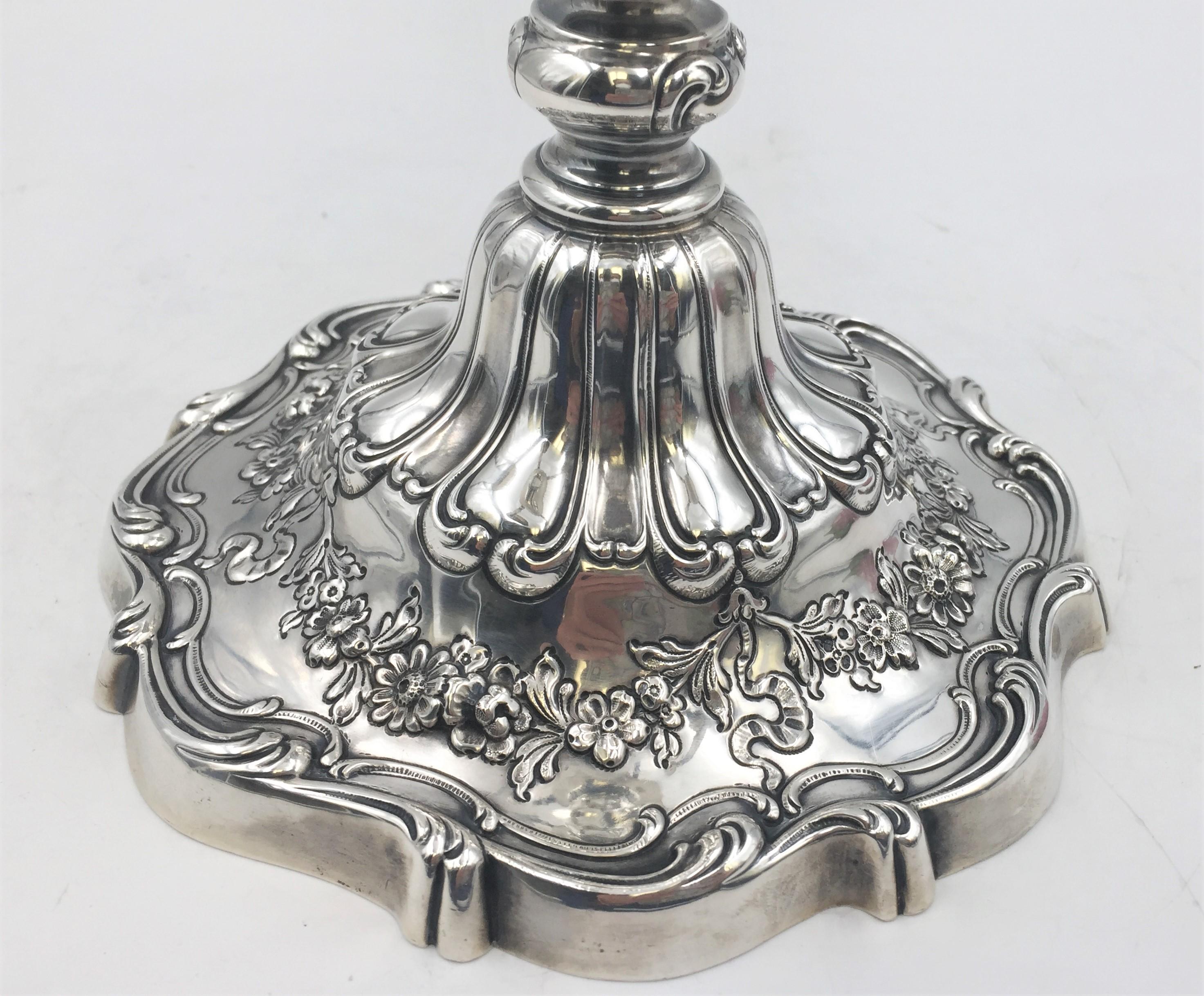 Gorham five-light candelabra in sterling silver in desirable Chantilly pattern with ornate floral and scroll decoration and five removable bobeches from 1959. Weighted and measuring 17'' from arm to arm and 16'' in height. Bearing hallmarks as