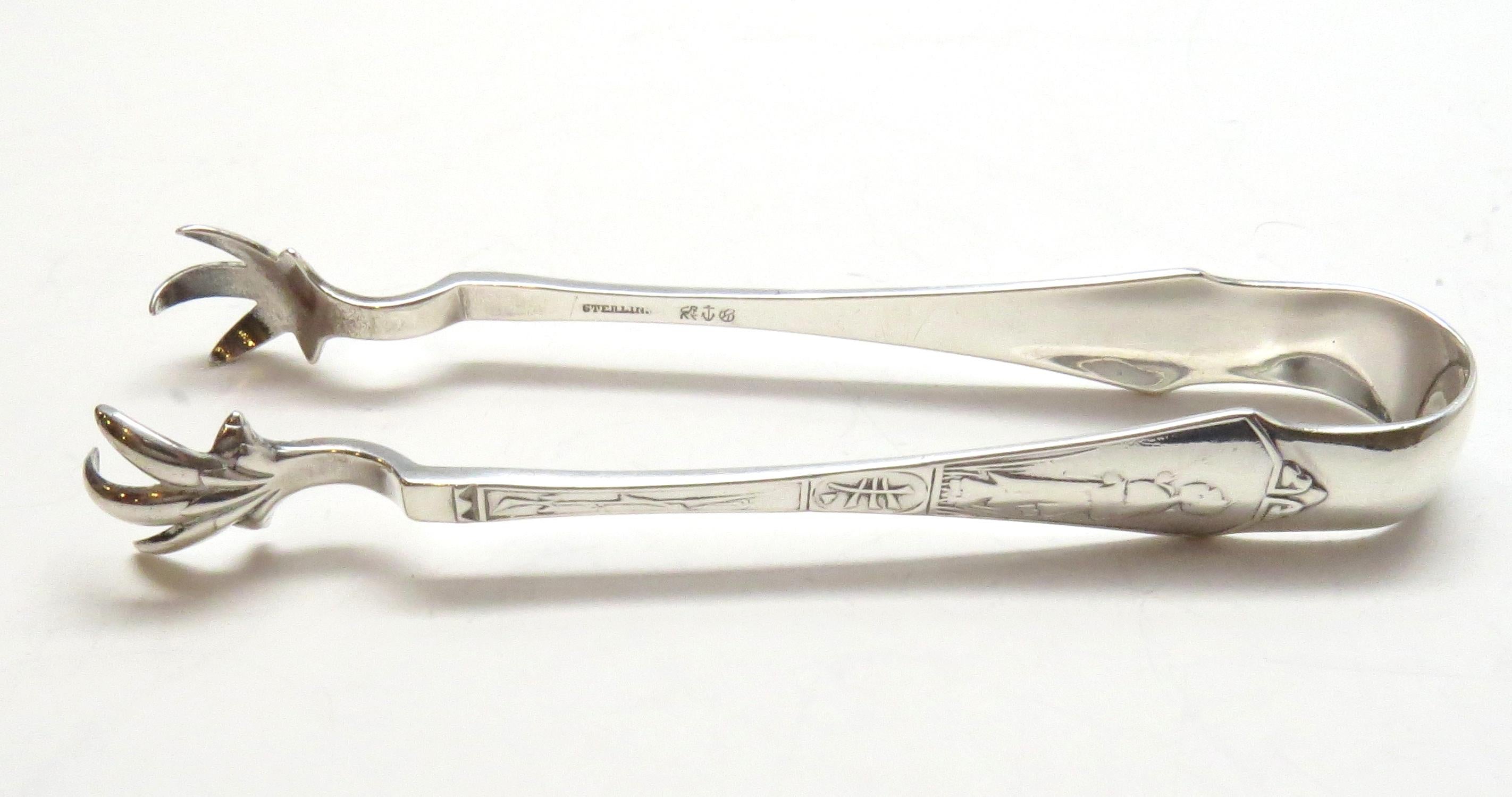 Gorham sterling silver sugar/ice tongs in the 1875 Japanese pattern.
 Marked: lion anchor G, Sterling, Starr & Marcus. 
Engraved on end appears to be: Stutzer. 
Measures 4 1/2