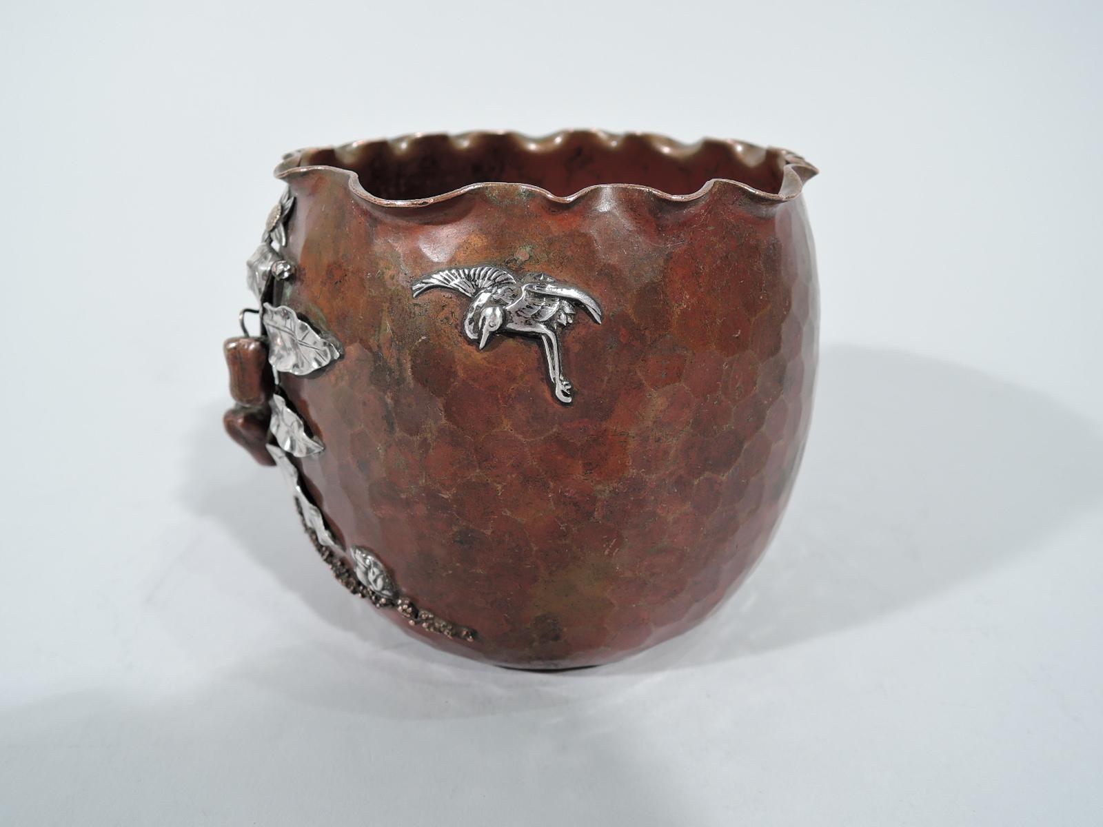 Japonesque mixed metal bowl. Made by Gorham in Providence in 1882. Copper bowl with curved sides and crimped rim. all-over honeycomb hand hammering. Applied silver and copper fruiting branch rooted in granulated soil. Applied silver bird, butterfly,