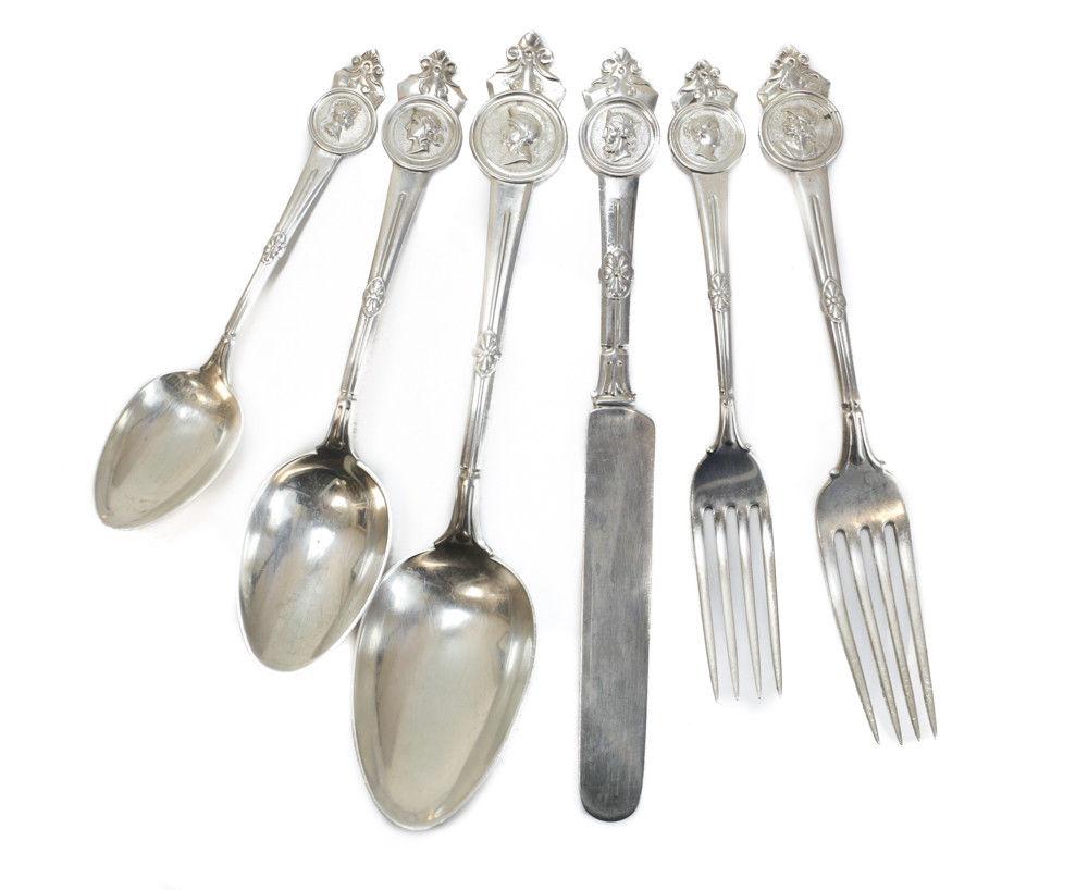 An exquisite Gorham Mfg Co. sterling silver 6 piece service for 12 in Medallion, Issued 1864. Hand chased florals to the handles with a figural warrior to the finial. Various different monograms to the verso. Marked to the back of the handle and
