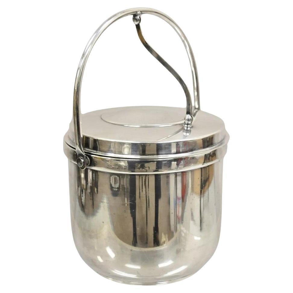 Cubitera Gorham de mediados del siglo XX con tapa abatible y forro de cristal