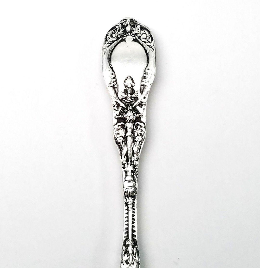 Gorham Mythologique sterling silver Bon Bon Spoon. 
Mythologique is a multiple motif pattern, this one is the old no bead border, no face bowl.
 No monogram. 
Measures approximate 4 5/8