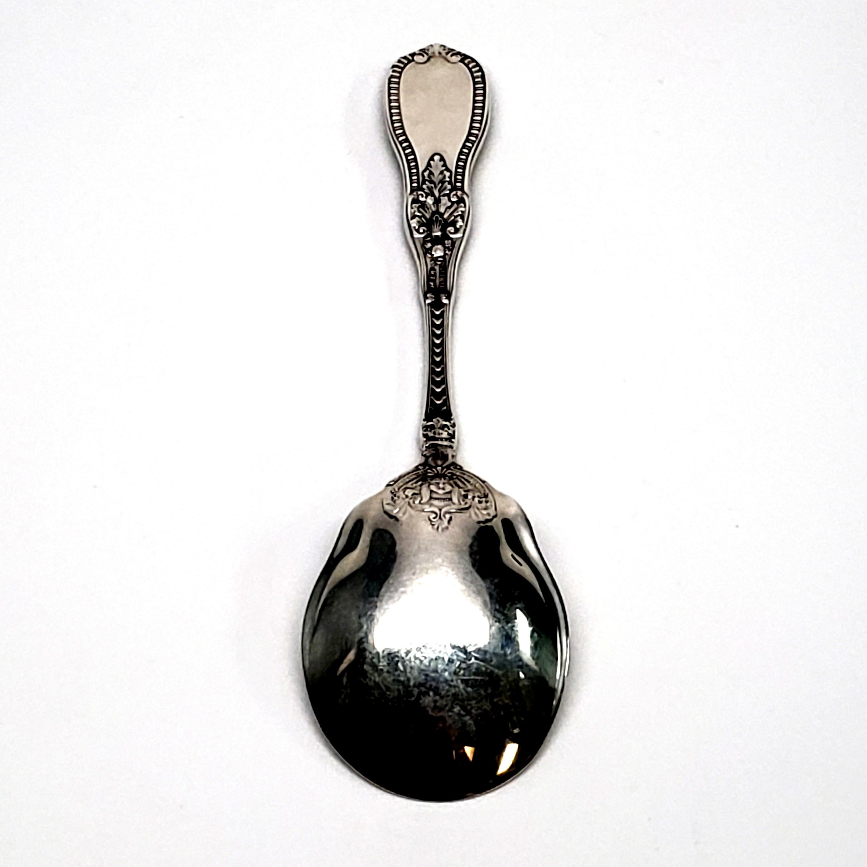 Sterling silver ice cream spoon by Gorham in the Mythologique pattern, circa 1986.

Gorham's Mythologique is a multi motif pattern, this piece is the newer bead border, face pattern, featuring a beaded border on the back handle and a face on the