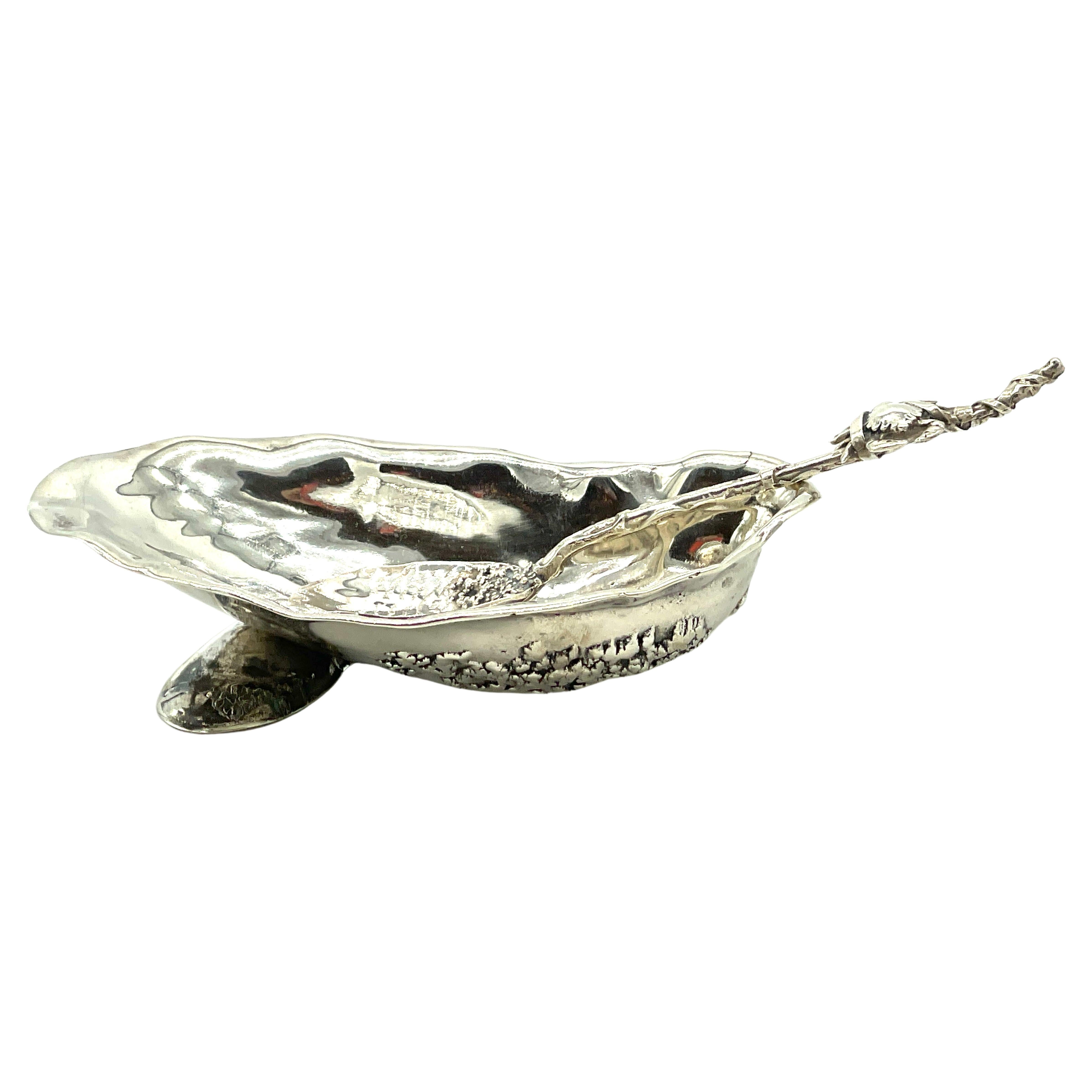 Gorham 'Narragansett' Sterling- Silver Shell Dish & Figural Crab Spoon
USA, circa 1890s 

A rare find, two piece set in one of scarcest patterns of the Gorham Mfg. Co. 'Narragansett', a sculptural Shell Dish & Figural Crab Spoon, this offering is