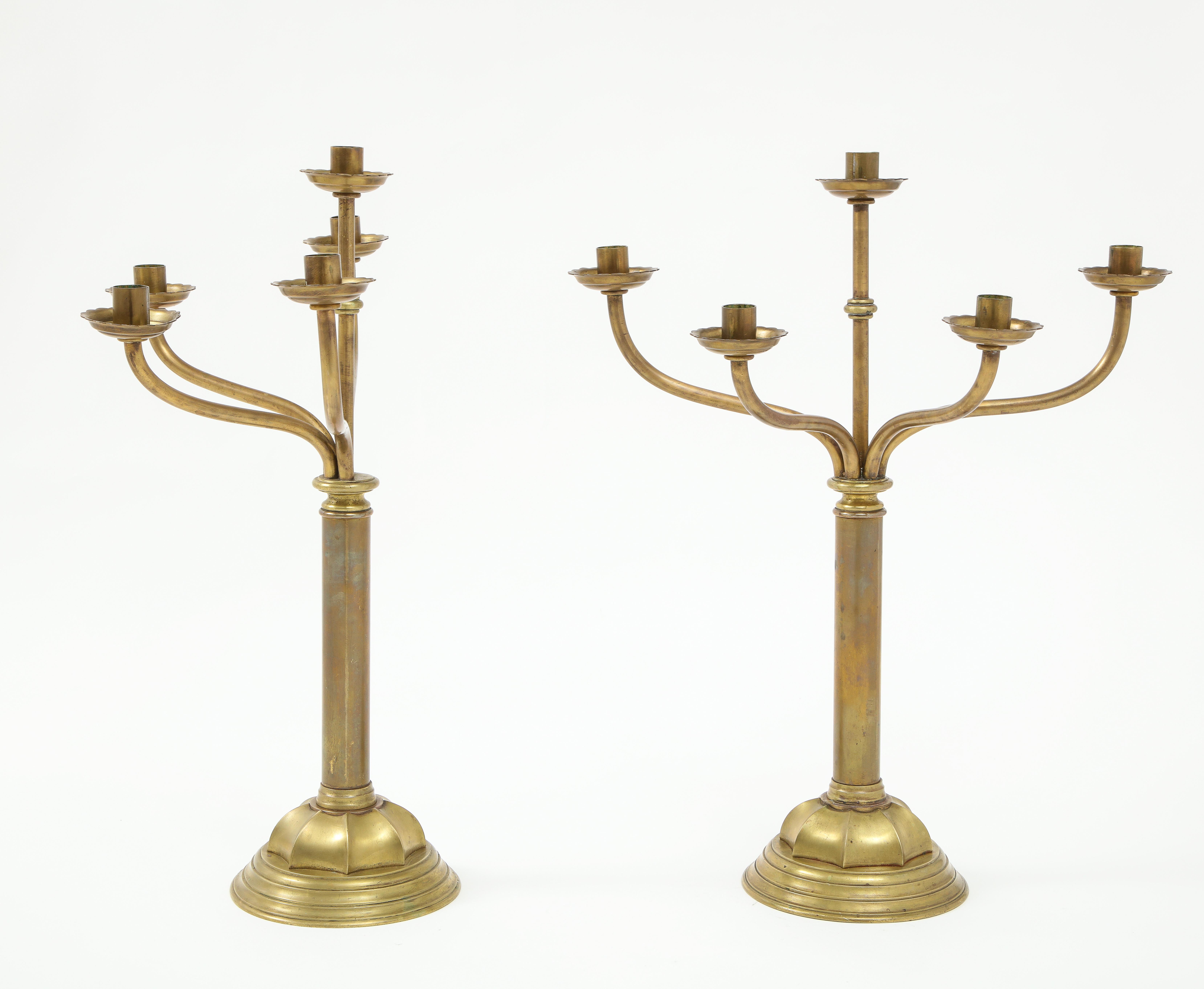 Stunning pair of large late 1800s solid brass 5-arm candlesticks by Gorham Co. In vintage original condition with some wear and patina due to age and use.