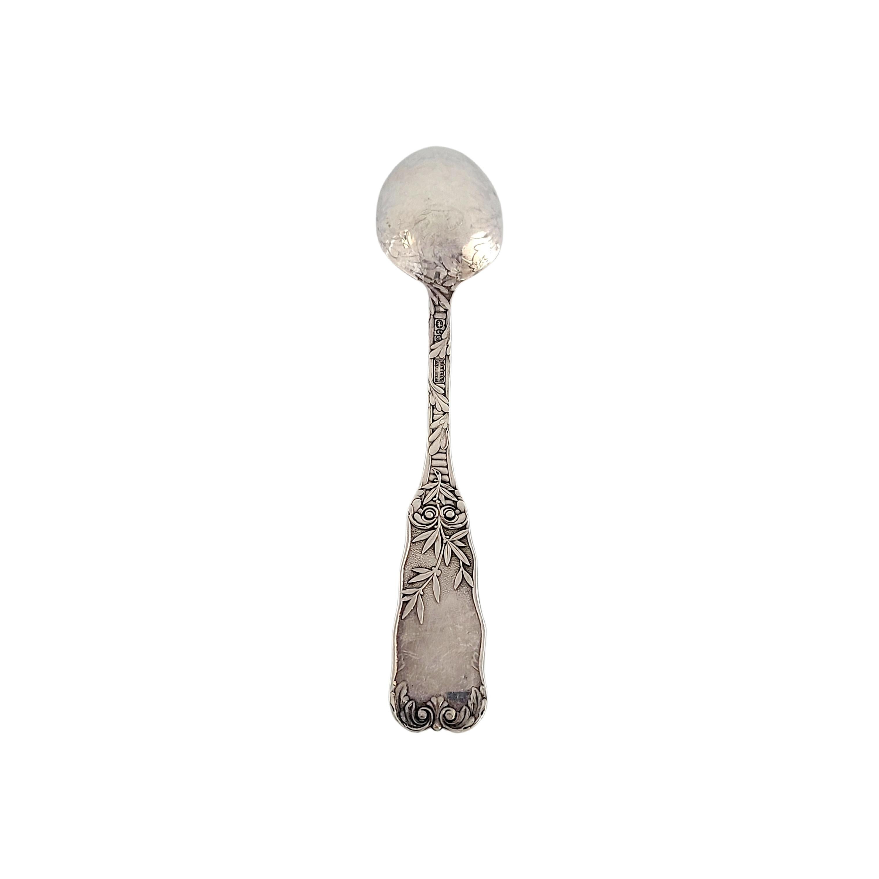 Sterling silver table spoon by Gorham in the St Cloud pattern.

No monogram.

Gorham's St Cloud pattern was designed by Walter Wilkinson in 1885. This spoon features a scroll and leaf design on the handle.

Measures 7 7/8