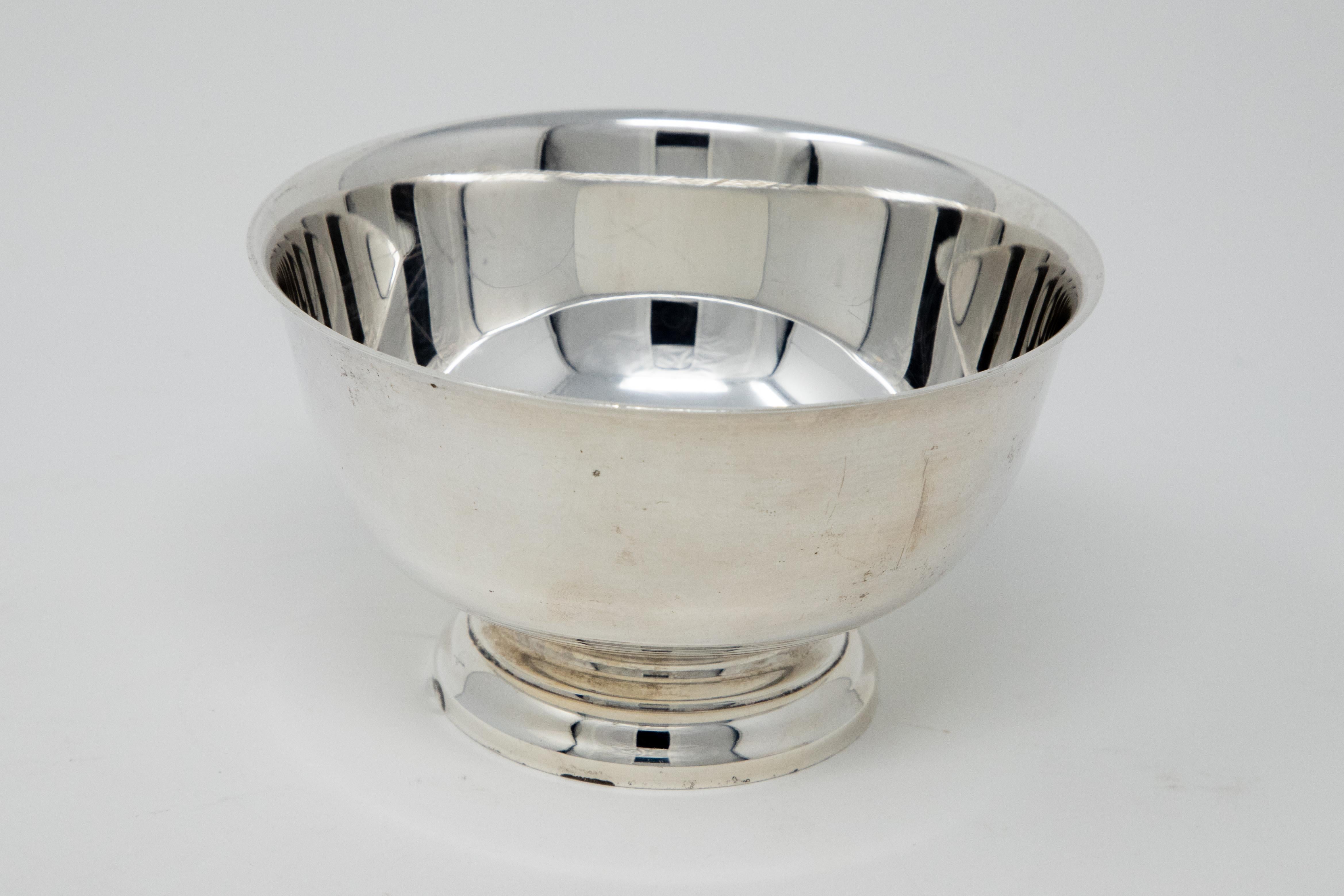 Offering this stunning sterling silver bowl by Gorham. Starting on a simple pedestal the bowl rises in a beautiful graduated shape. Marked on the bottom with Gorham, trademarks, STERLING, 41657. P. Revere reproduction.