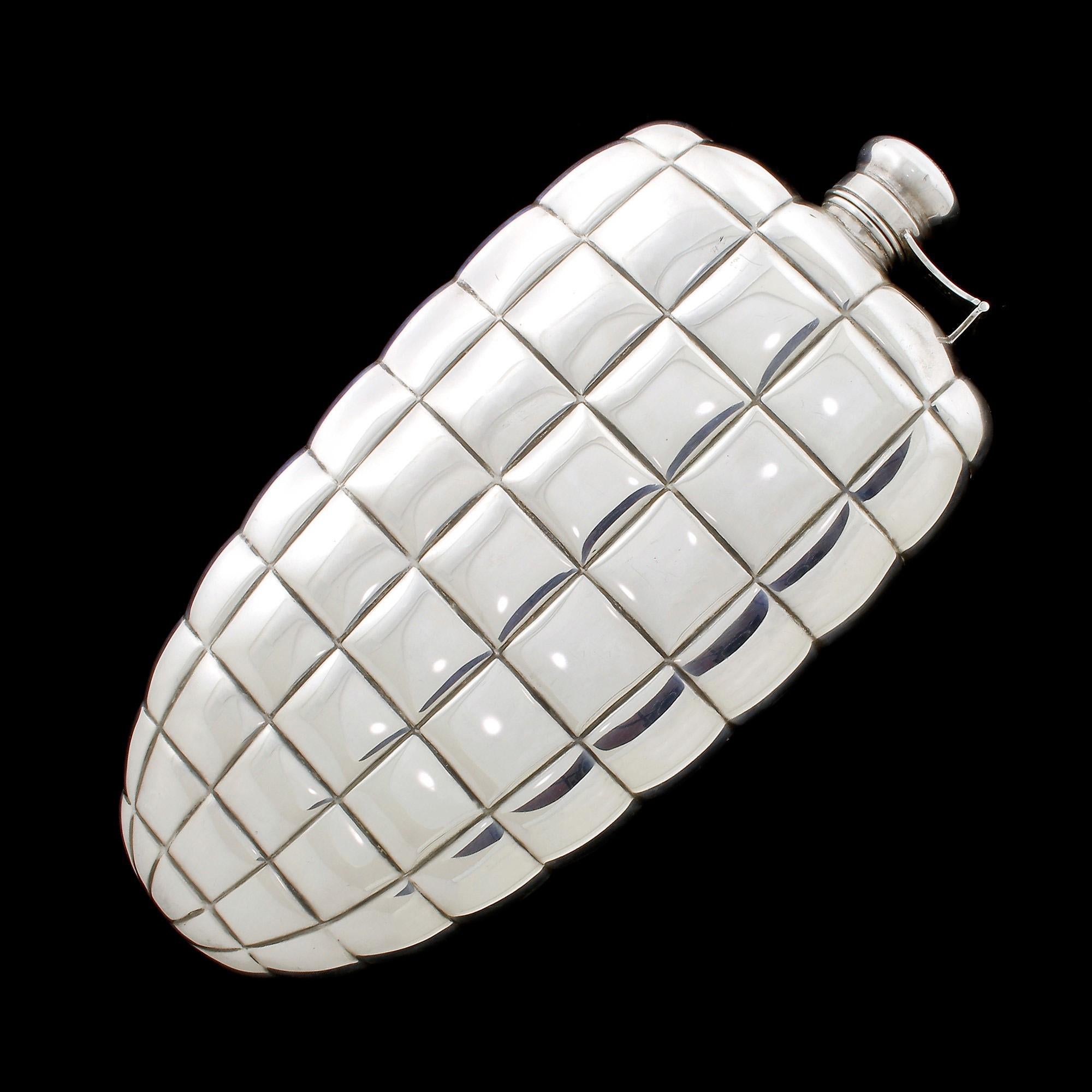 We are happy to present this beautiful vintage sterling silver 1 pint flask made by Gorham in the elusive Crocodile pattern.
This exact design and size was a favorite of the screen legend Clark Gable, and they are highly sought after today.
Ever