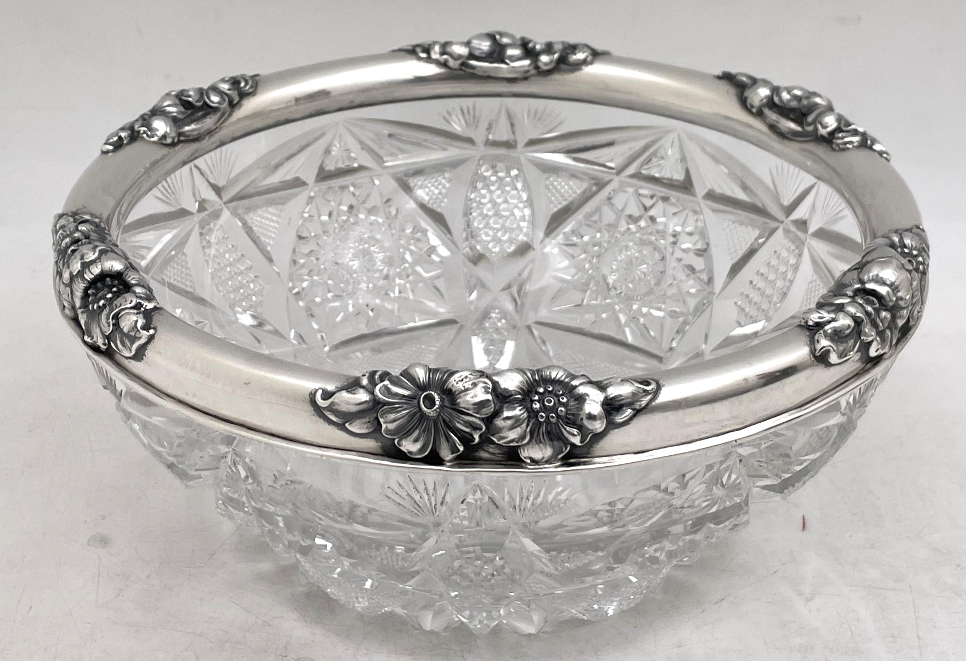 Gorham sterling silver and cut glass (in the diamond pattern) bowl from 1903 and in Art Nouveau style, the rim beautifully adorned with varied floral motifs. This exquisitely well-crafted bowl measures 8 1/3'' in diameter by 3 7/8'' in height and