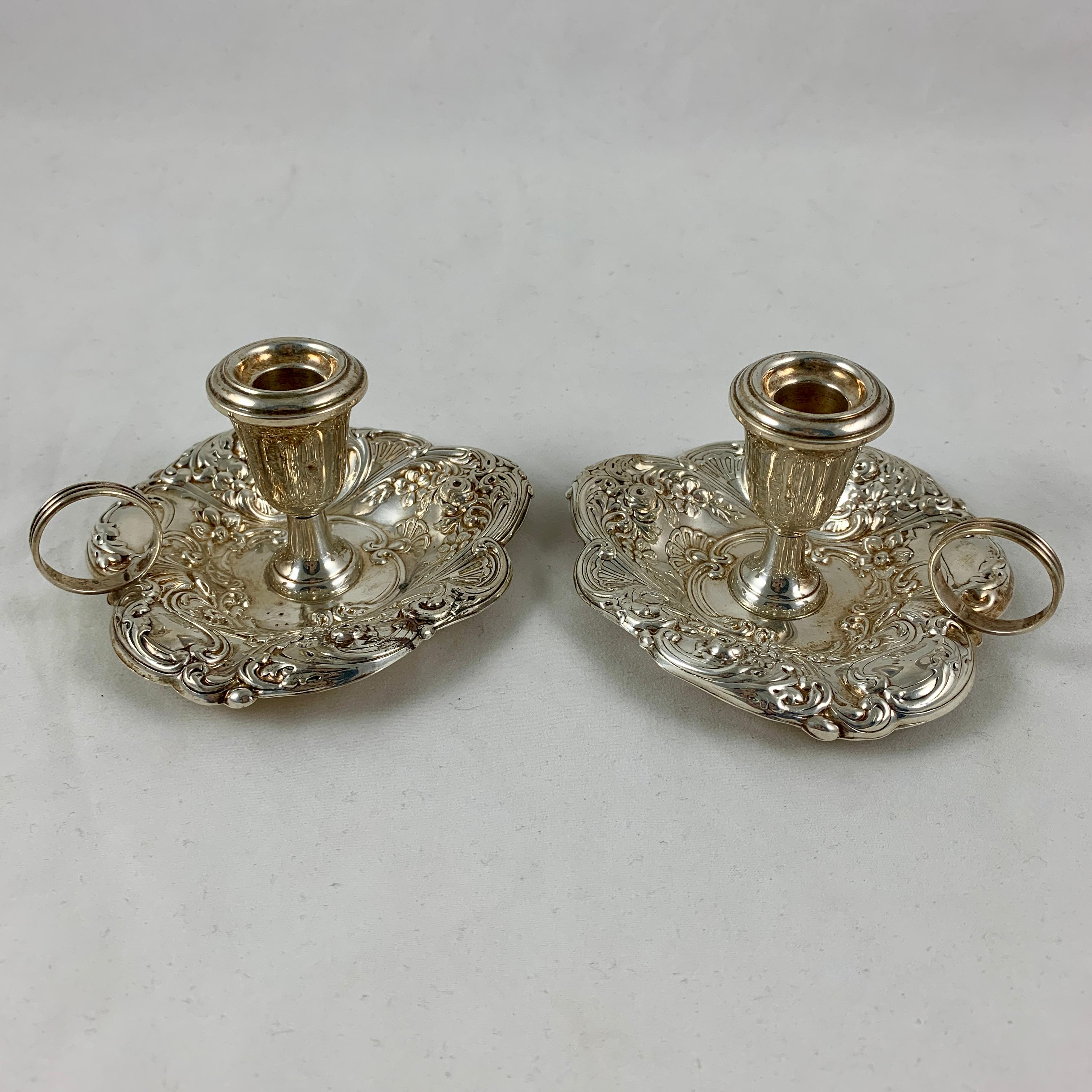 American Classical Gorham Sterling Silver Floral Repoussé Chambersticks, circa 1920-1930, a Pair For Sale